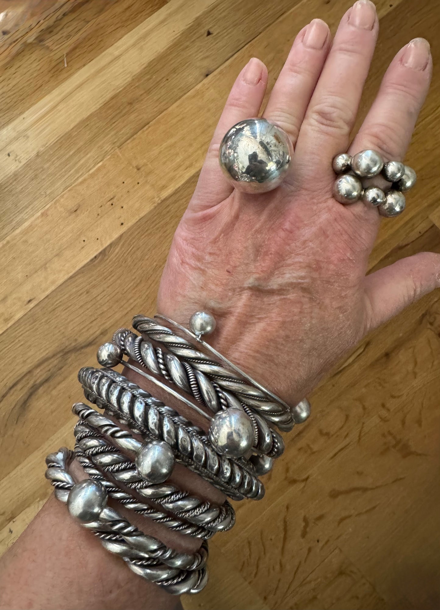 Pair of handmade vintage sterling ball bangles