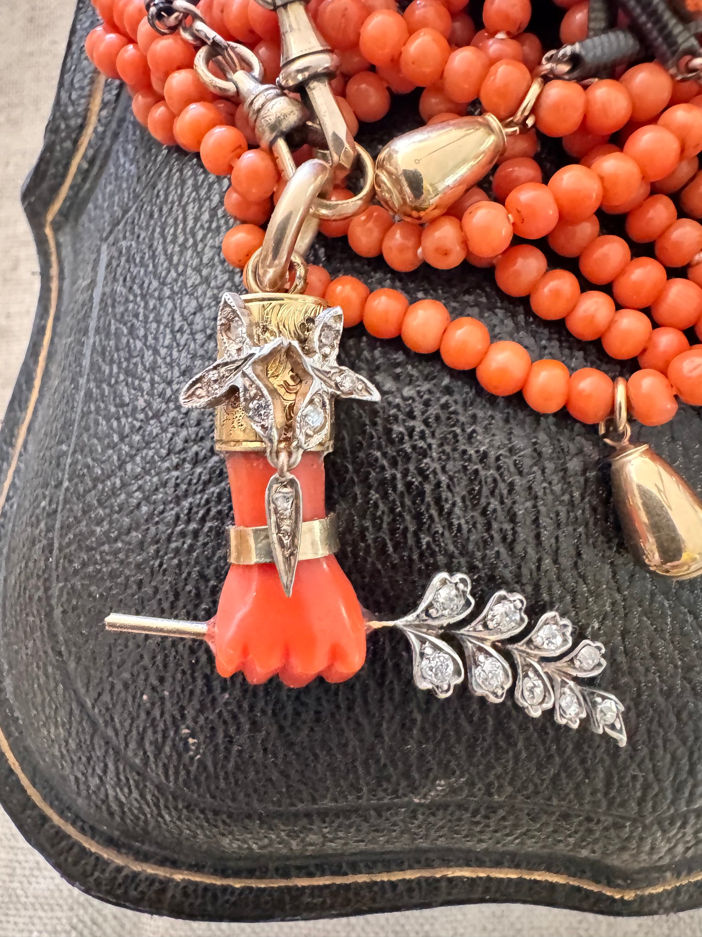Antique Coral Hand with Diamond Frond