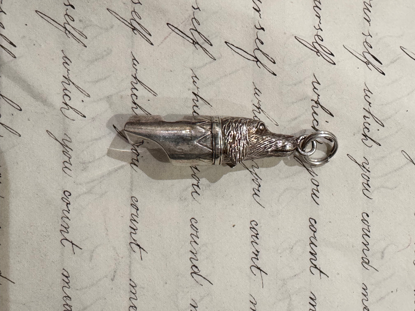 sterling silver English dog shaped whistle