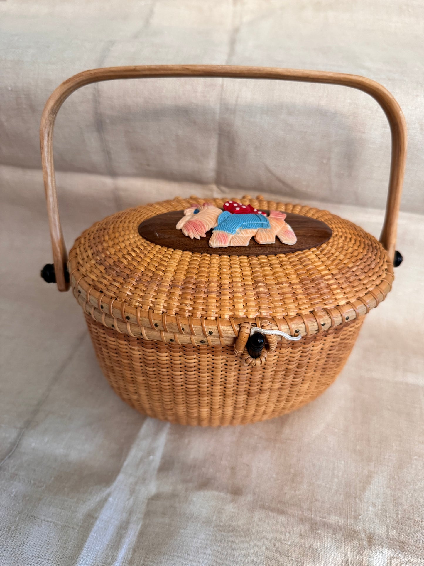 Large Oval Nantucket Basket with Adorable Vintage Celluloid Dog