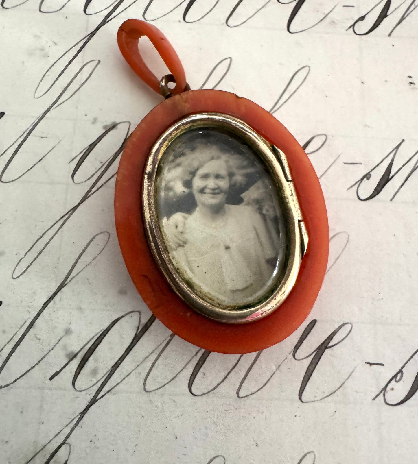 Beautiful antique celluloid locket with gold and silver inlay