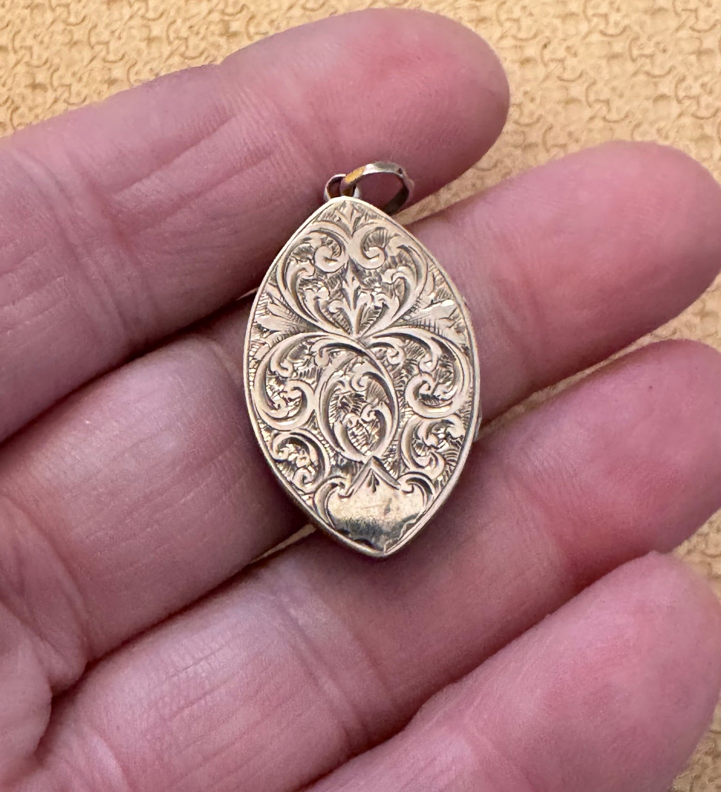 8kt Gold Fully Engraved Marquise Shaped Locket