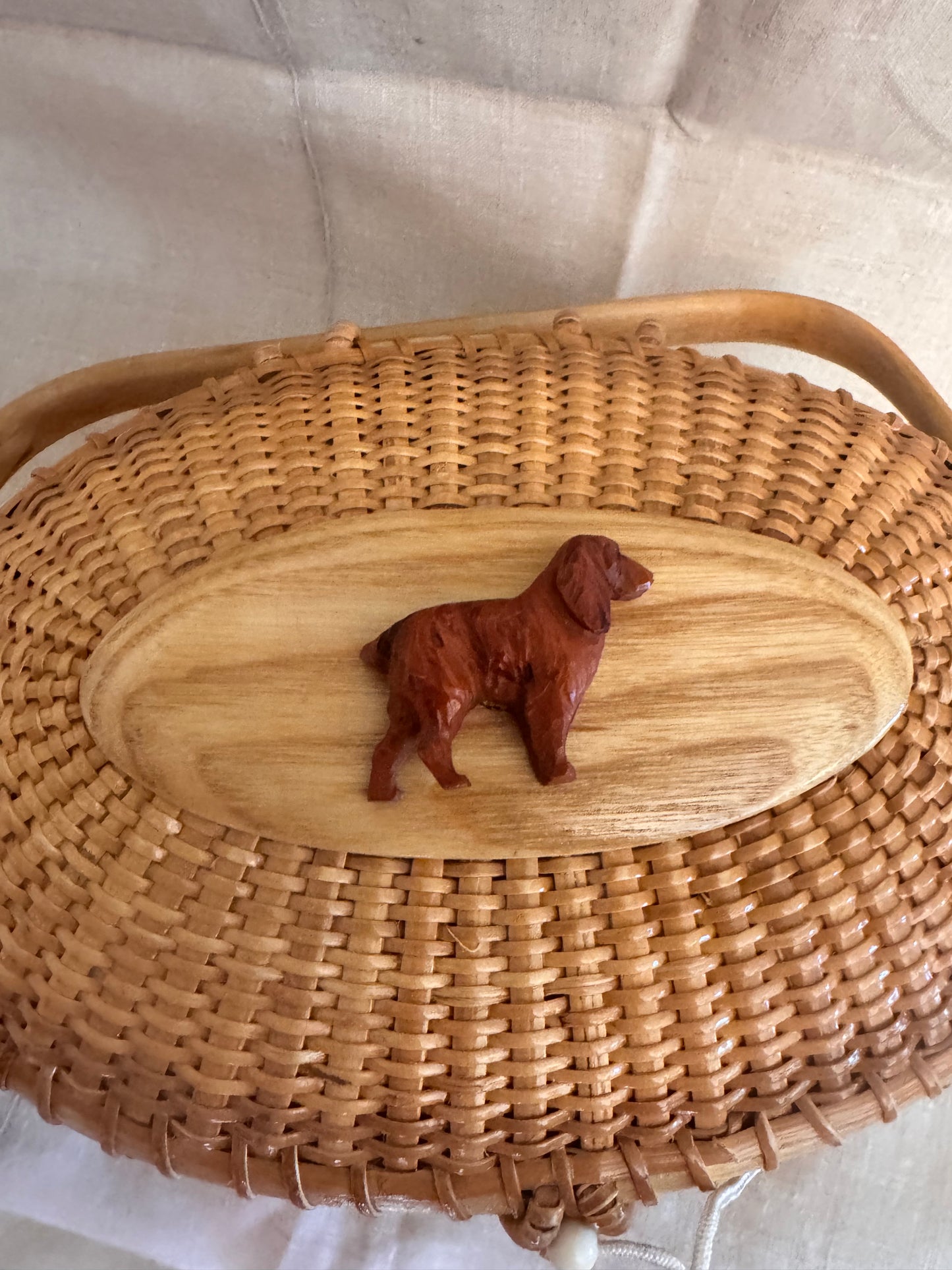 Large Oval Nantucket Basket with Carved Vintage Bakelite Dog