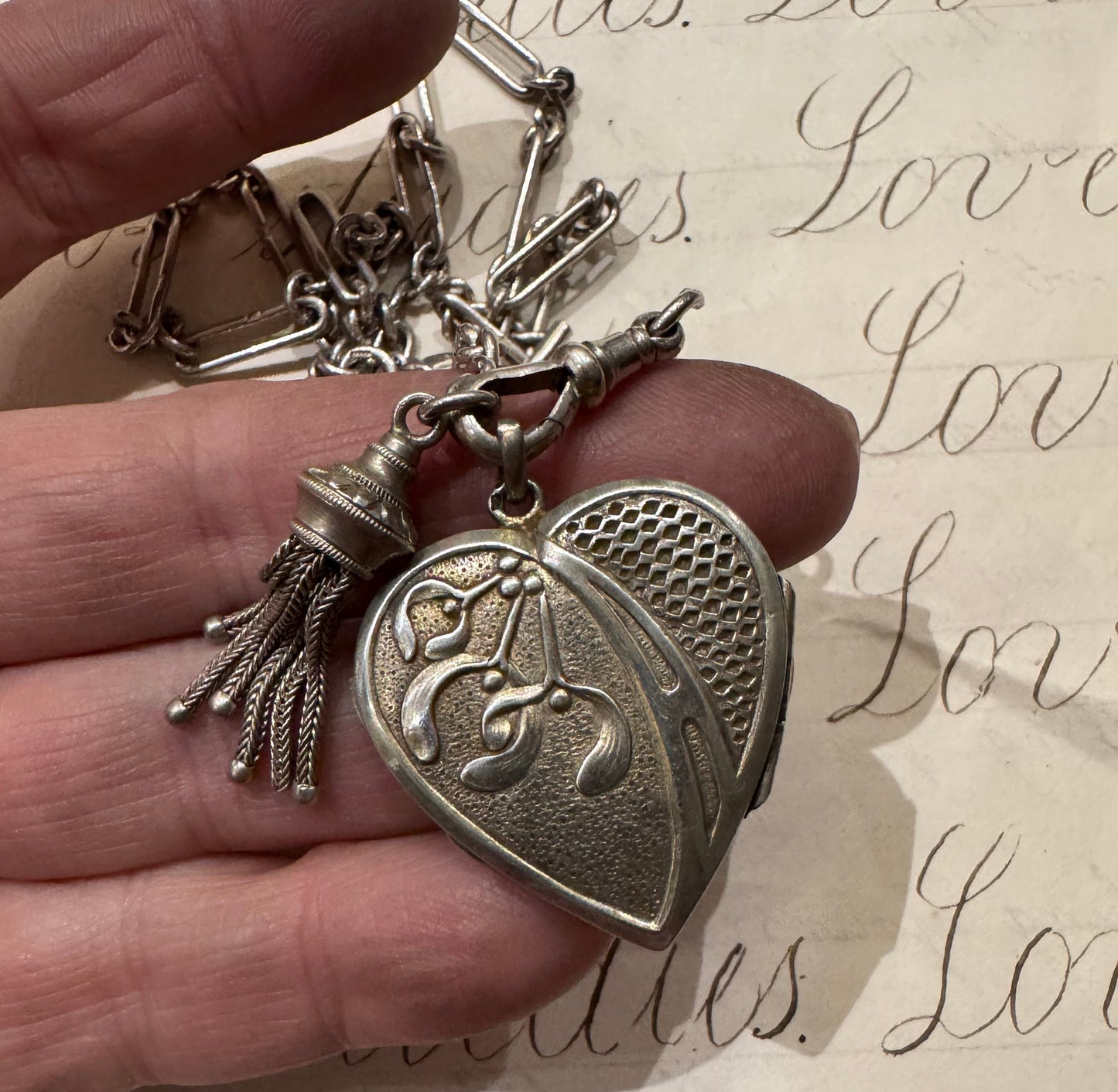 lovely English watch chain with two heart lockets and tassel