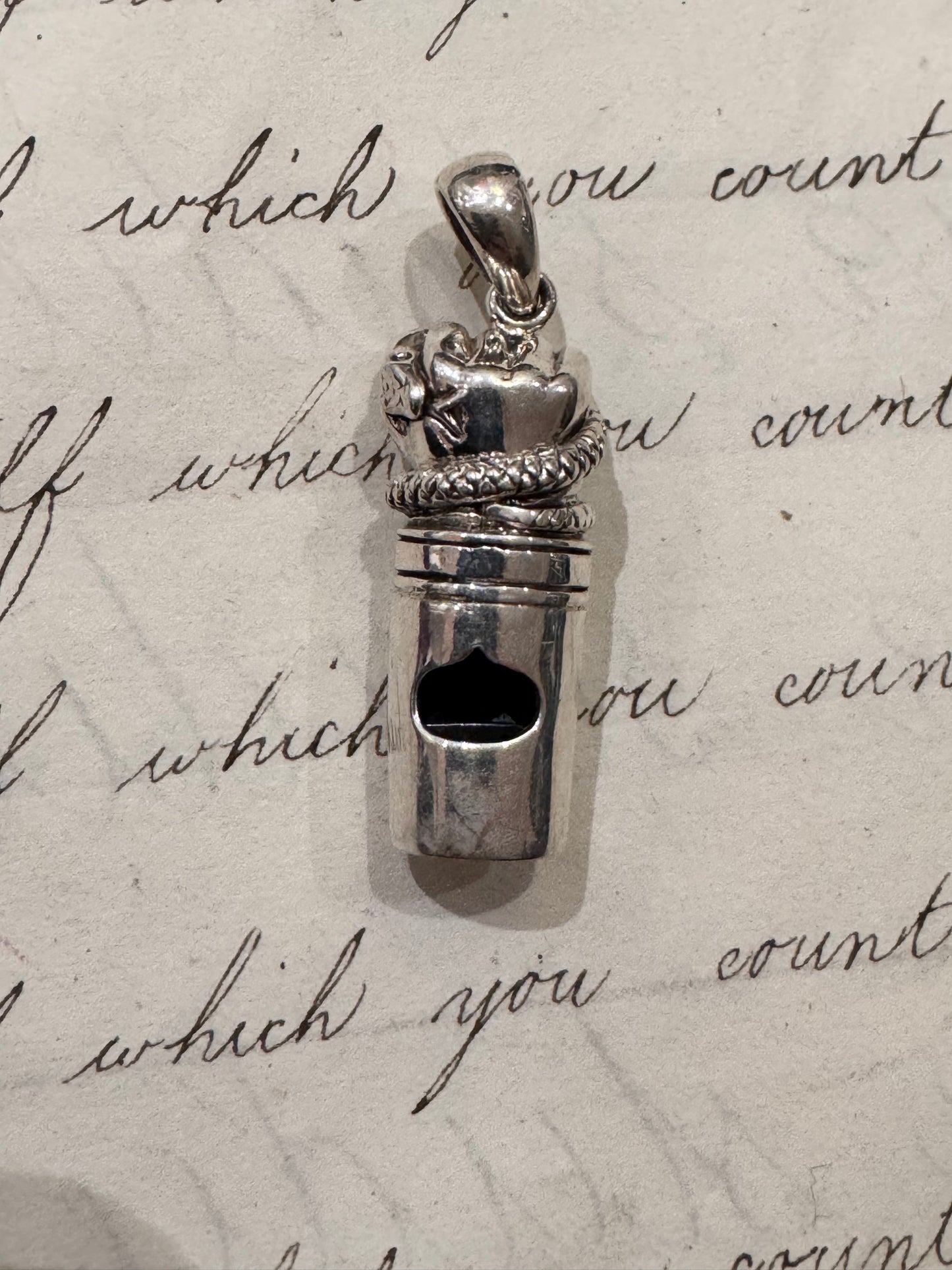 incredible English Sterling whistle with a fist clutching a snake