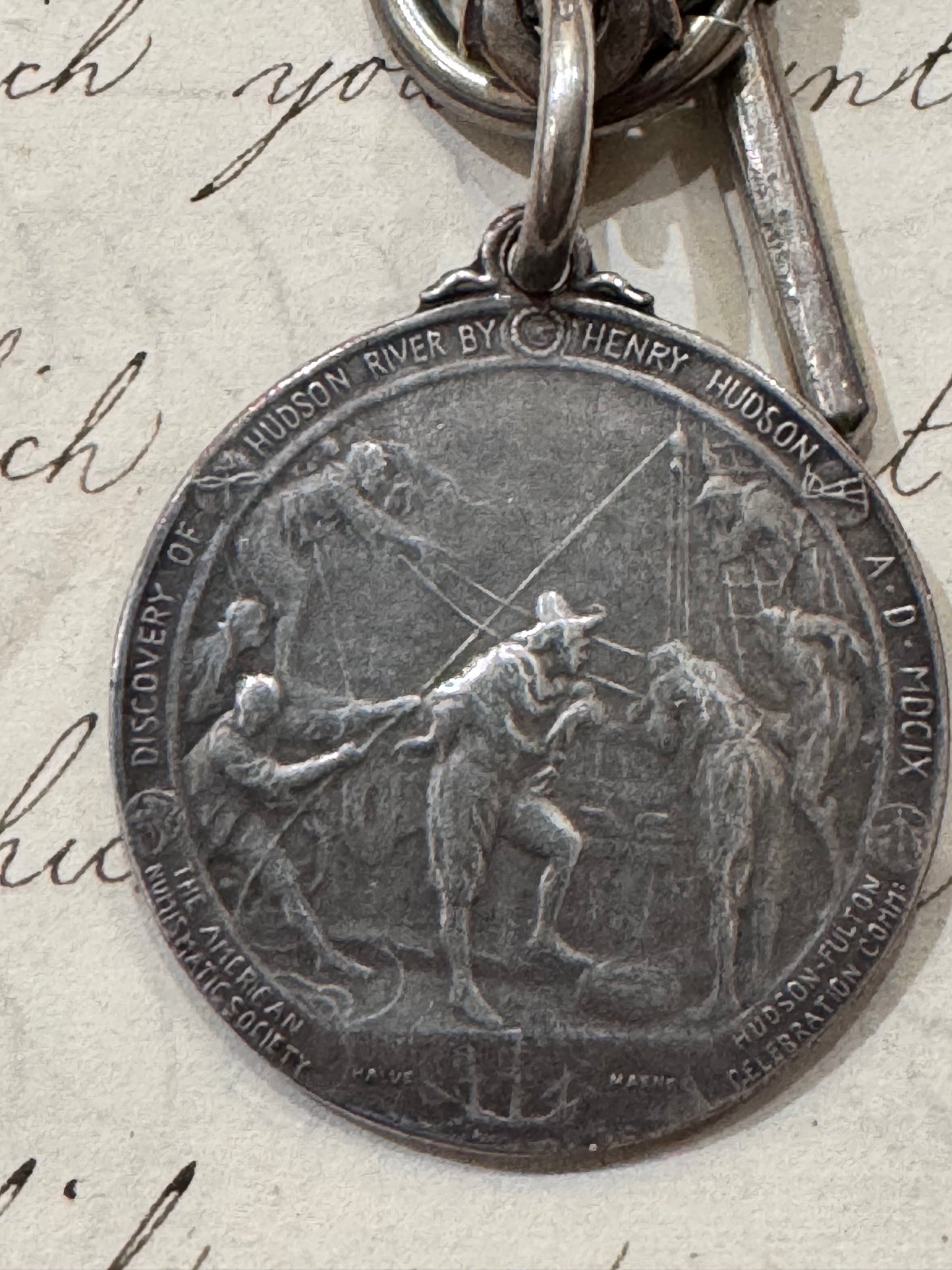 very old silver plated watch chain with fob and rare silver Henry Hudson medallion