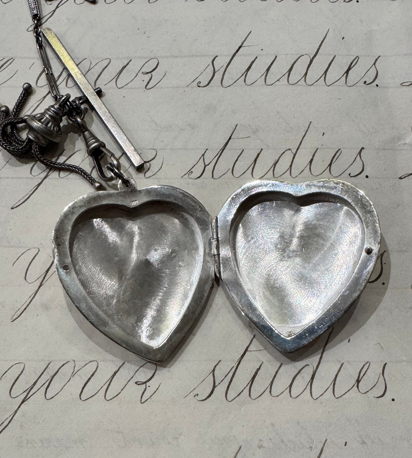 antique chain with large engraved heart locket and dated hanger with initials