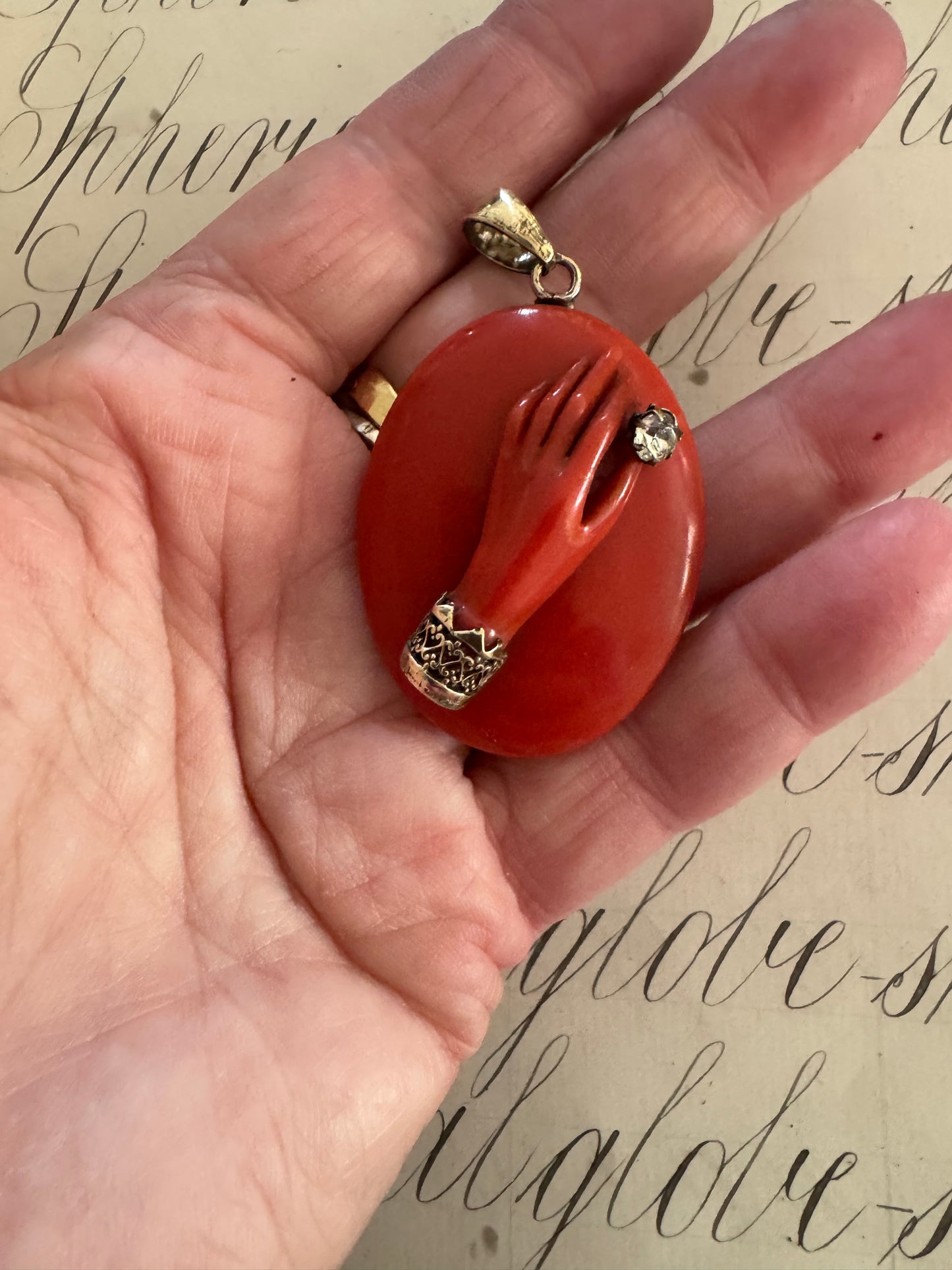 Beautiful antique celluloid locket with hand