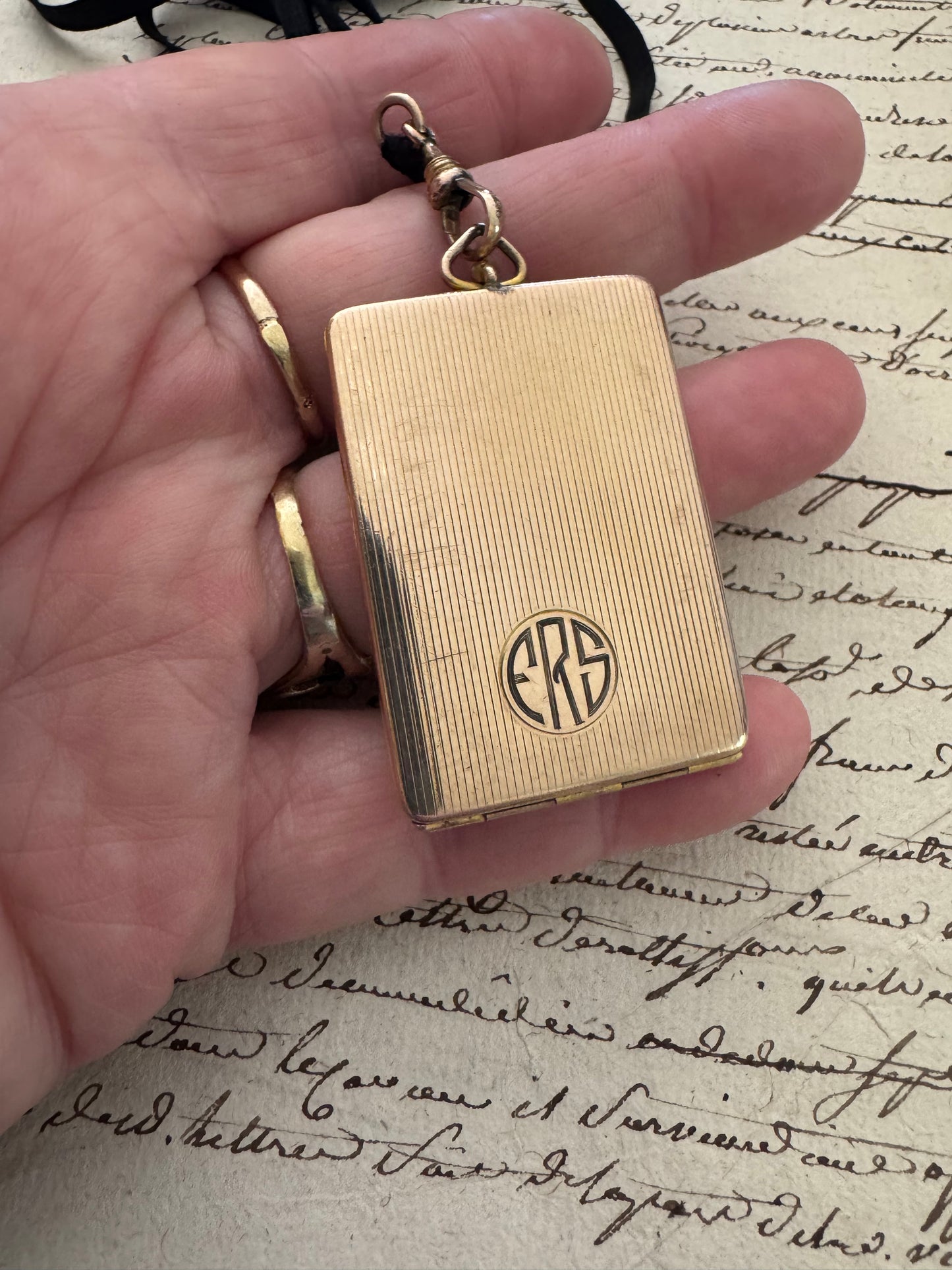 rectangular gold filled engraved Art Deco locket on original ribbon