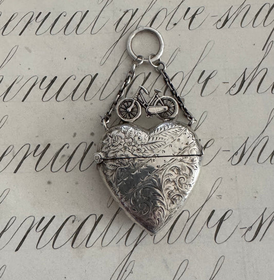 Incredible heart shaped match safe with bicycle