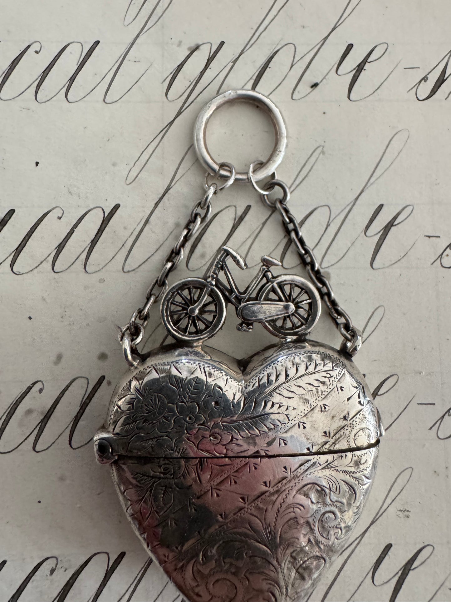 Incredible heart shaped match safe with bicycle