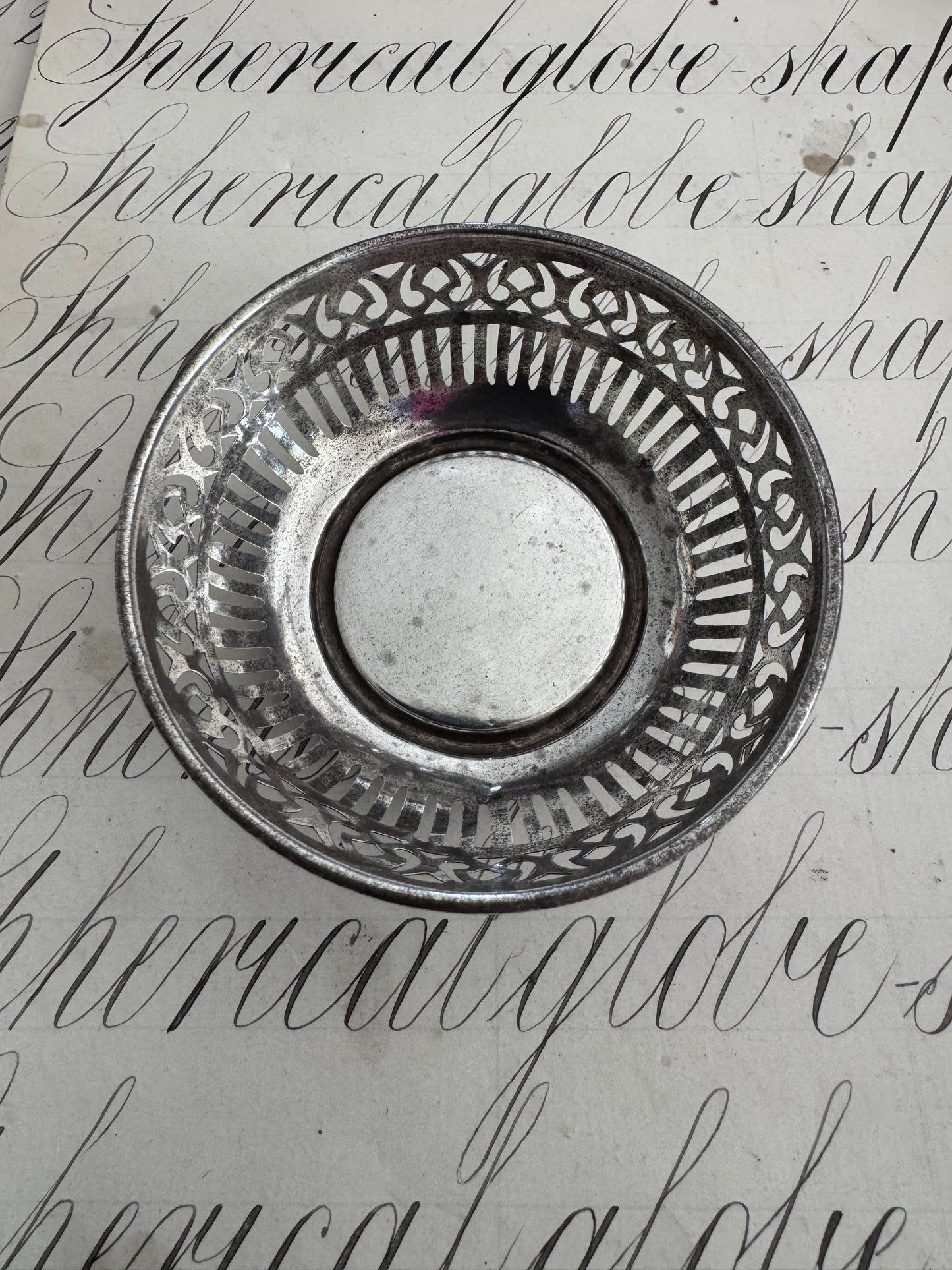 charming small round sterling pierced trinket dish