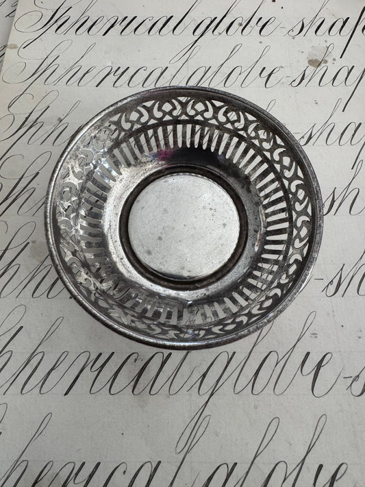 charming small round sterling pierced trinket dish
