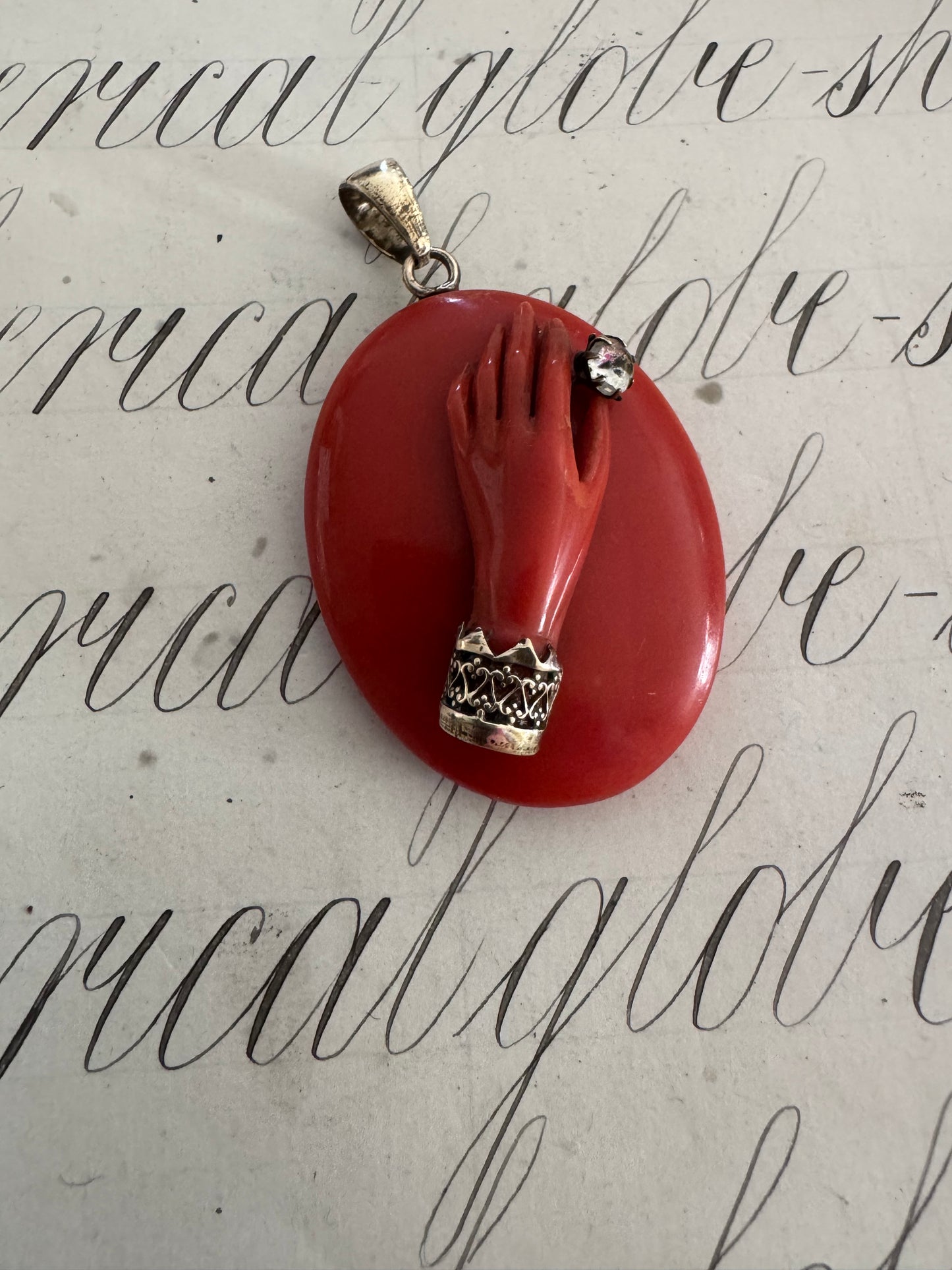 Beautiful antique celluloid locket with hand