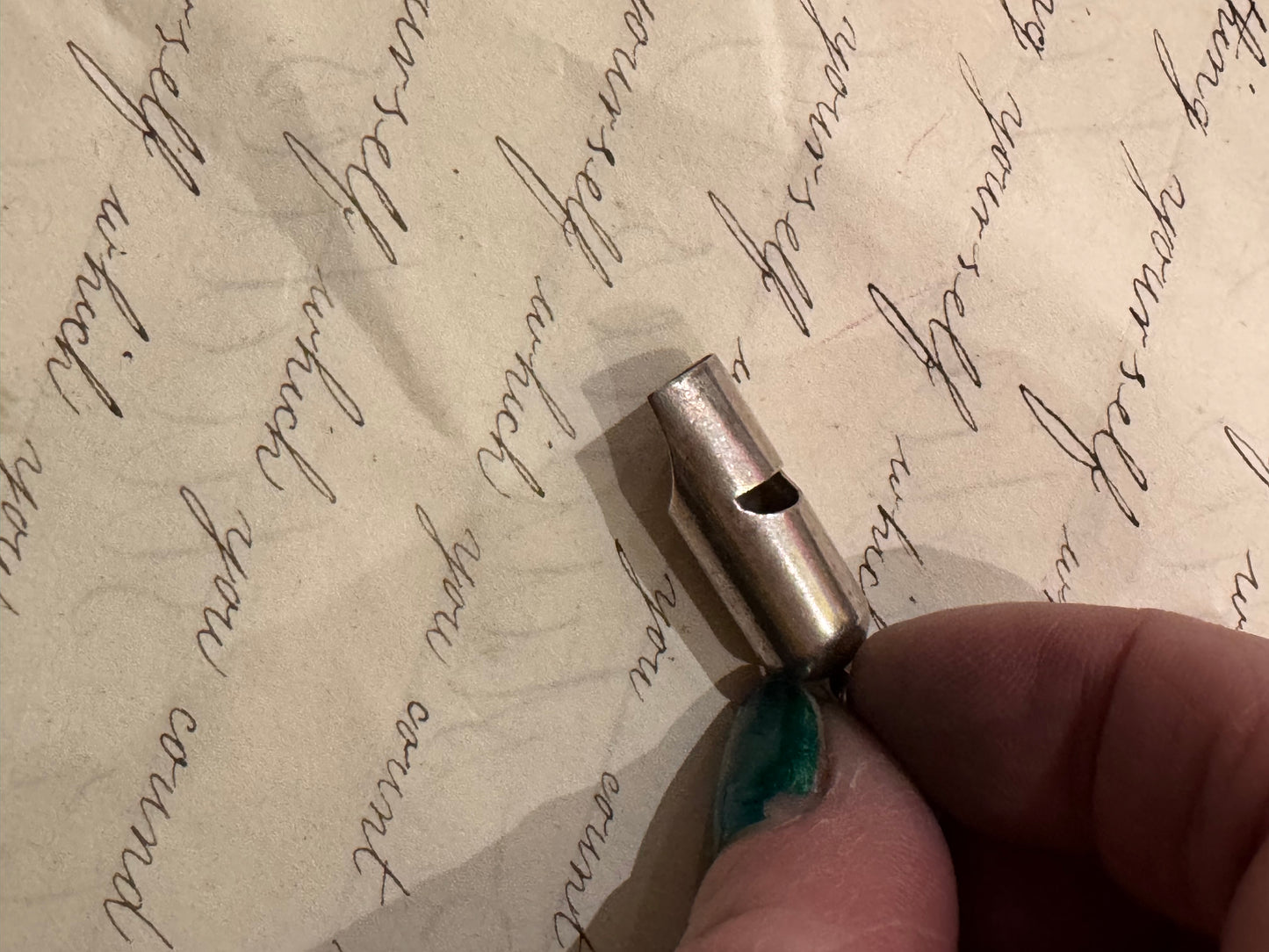 smaller, simple silver VERY LOUD whistle