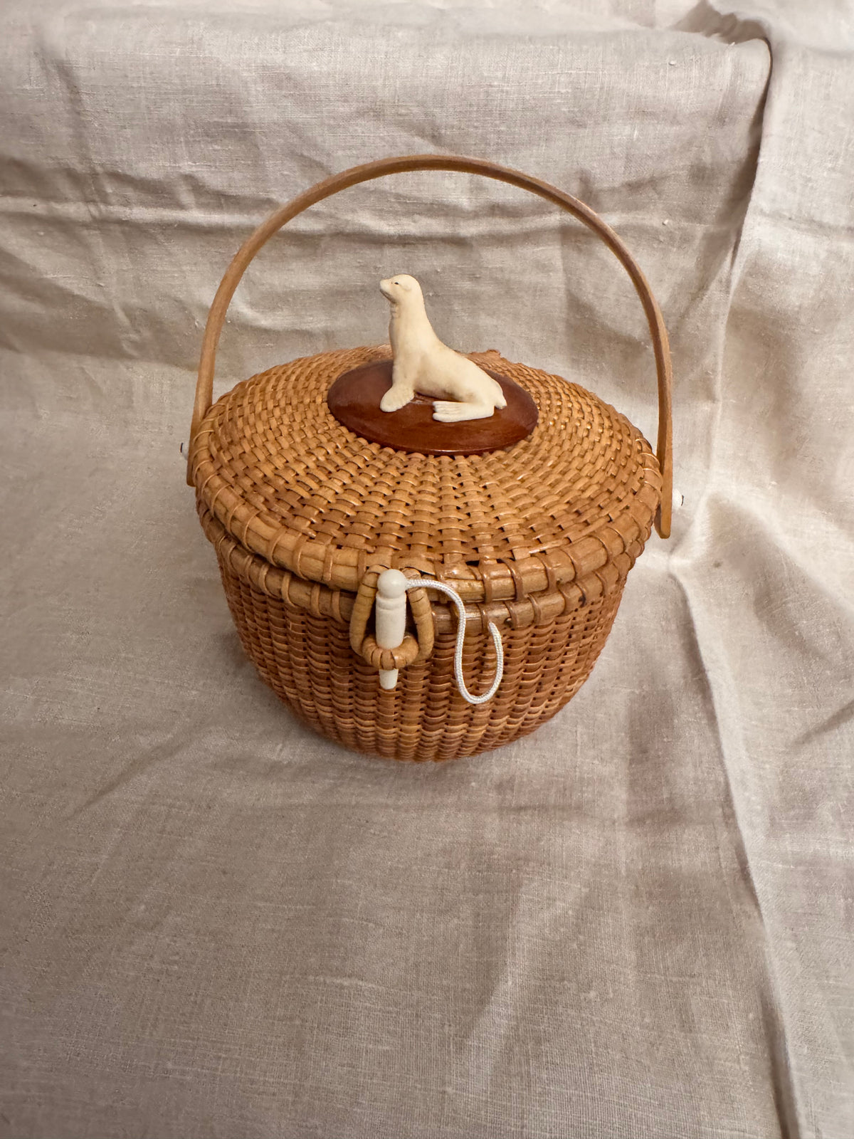 Medium Round Basket with Faux Ivory 3-Dimensional Seal on the Lid