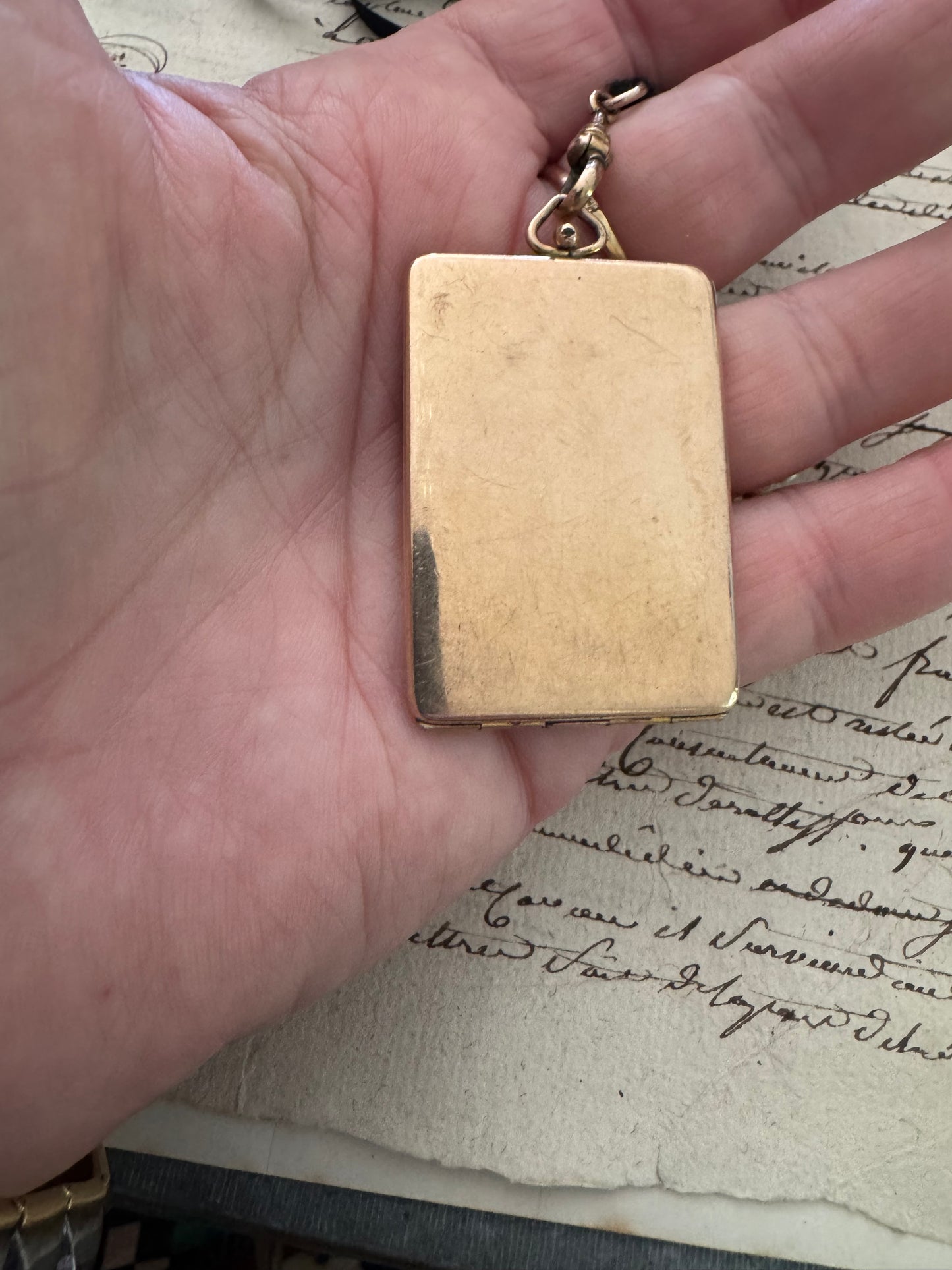 rectangular gold filled engraved Art Deco locket on original ribbon