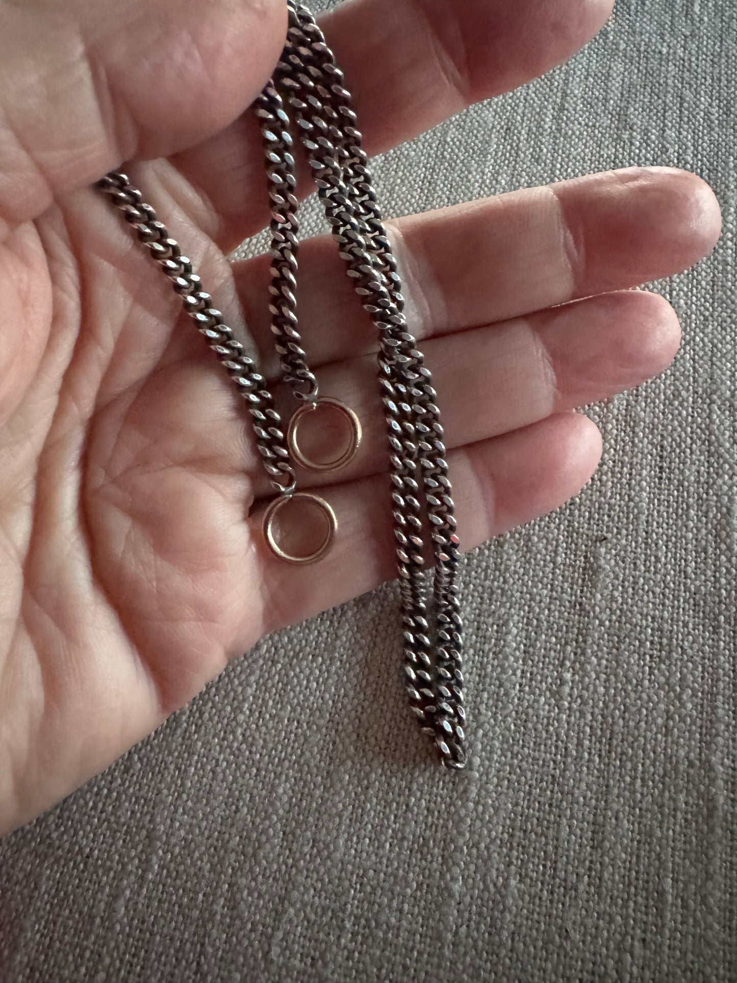 Flattened curb link with 14k rings
