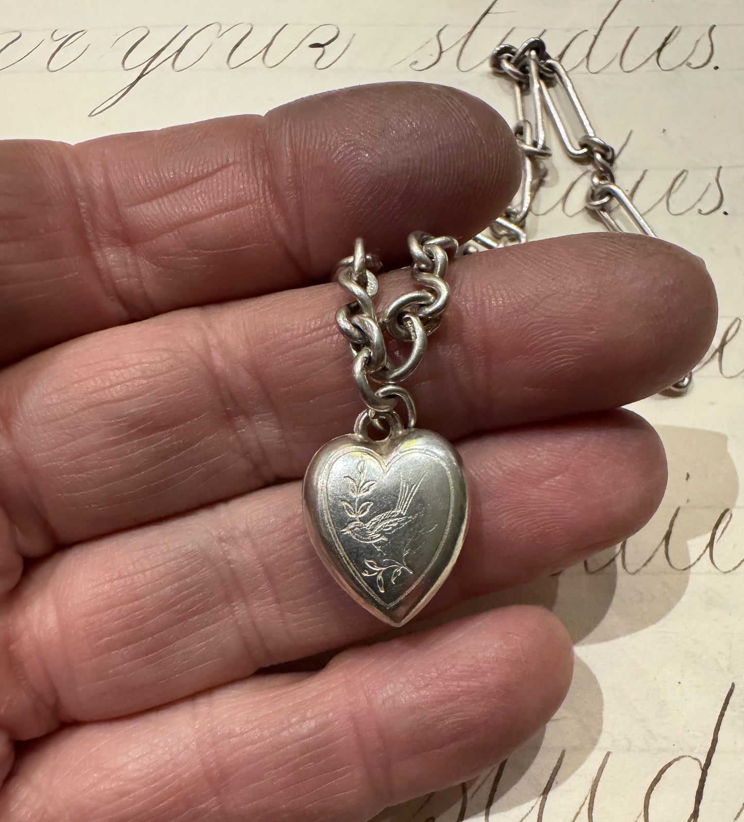 lovely English watch chain with two heart lockets and tassel