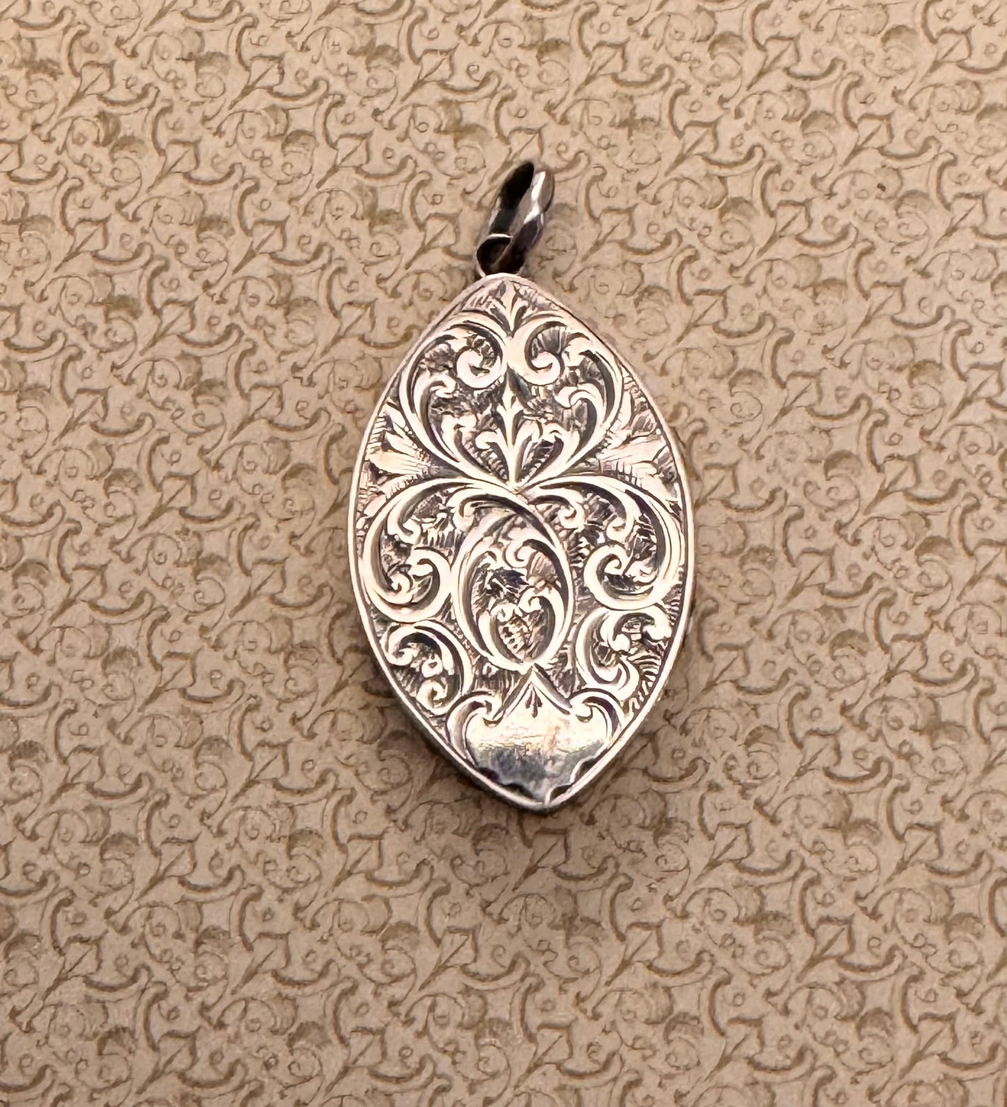 8kt Gold Fully Engraved Marquise Shaped Locket