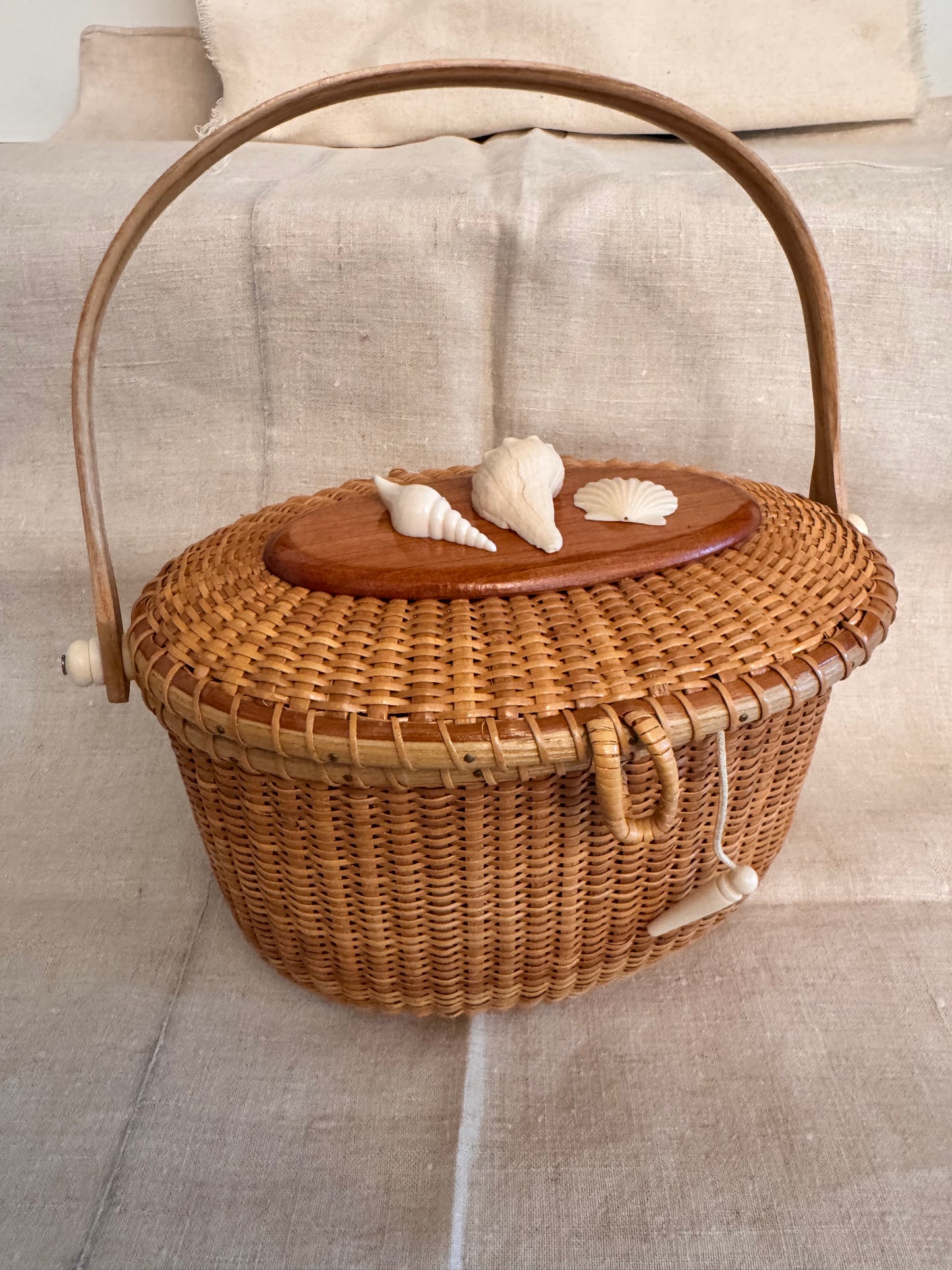 Large Oval Basket with Three Carved Shells