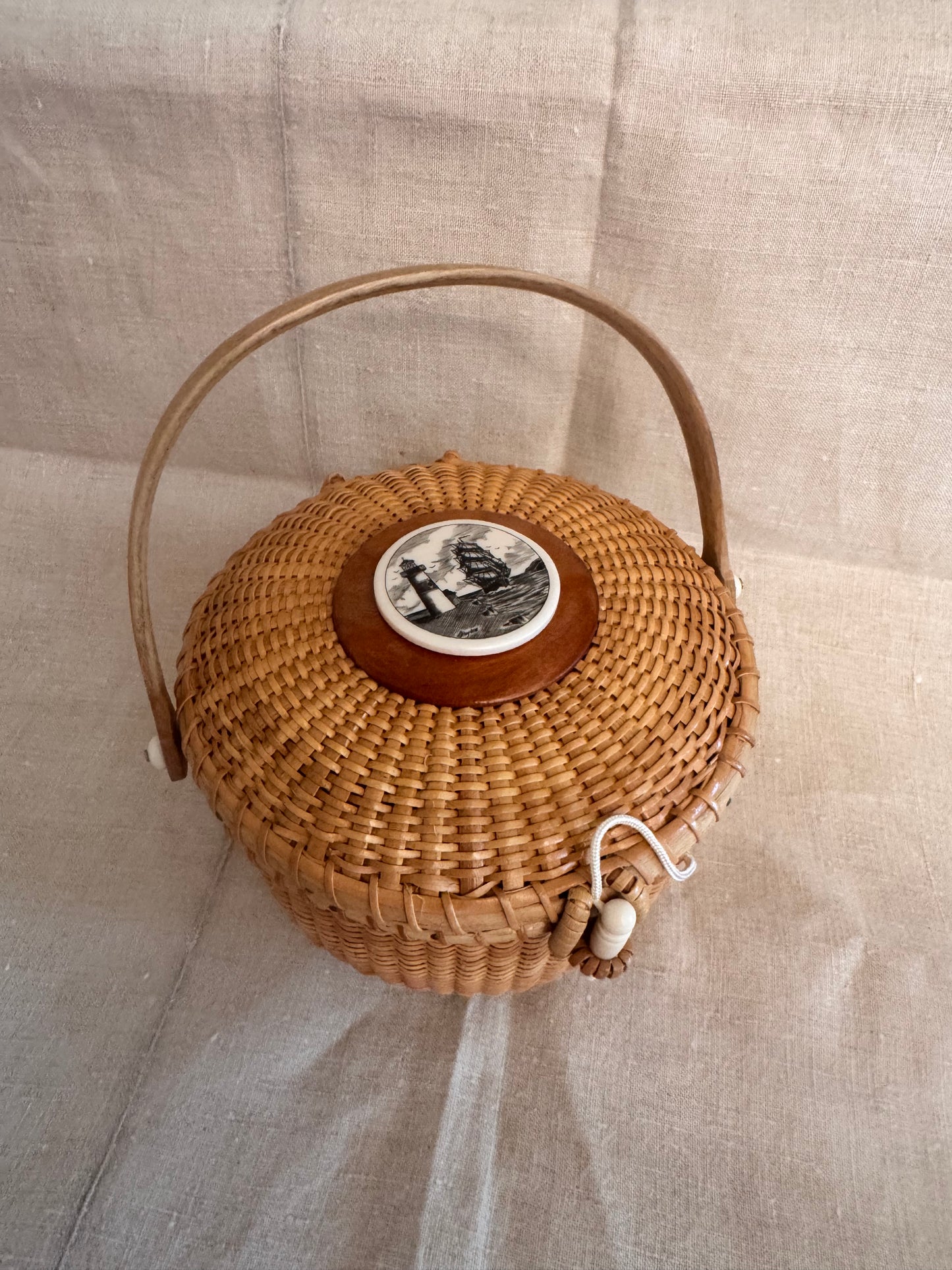 Medium Round Basket with Reproduction Scrimshaw Lighthouse and Schooner