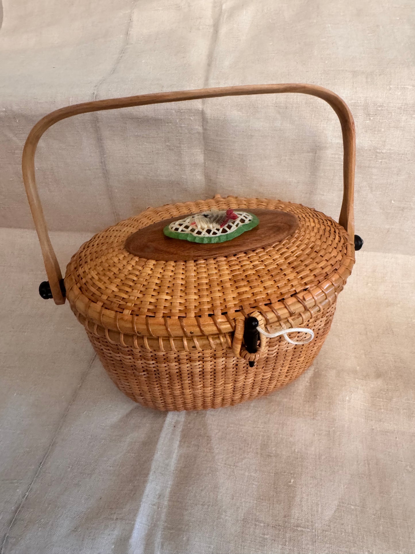 Large Oval Nantucket Basket with Charming Celluloid Scottie with Red Bow