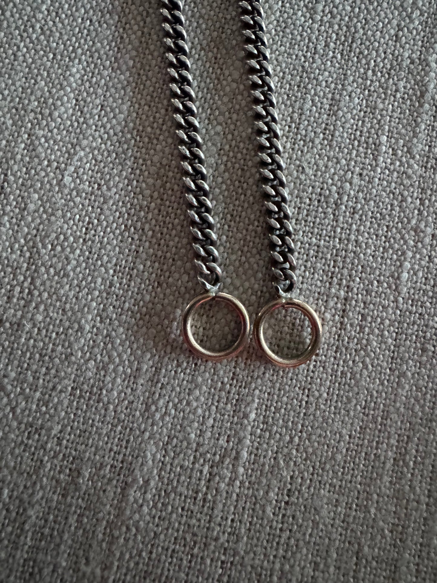 Flattened curb link with 14k rings