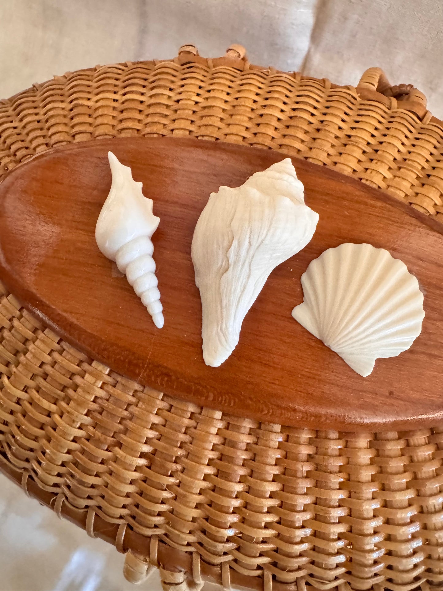 Large Oval Basket with Three Carved Shells