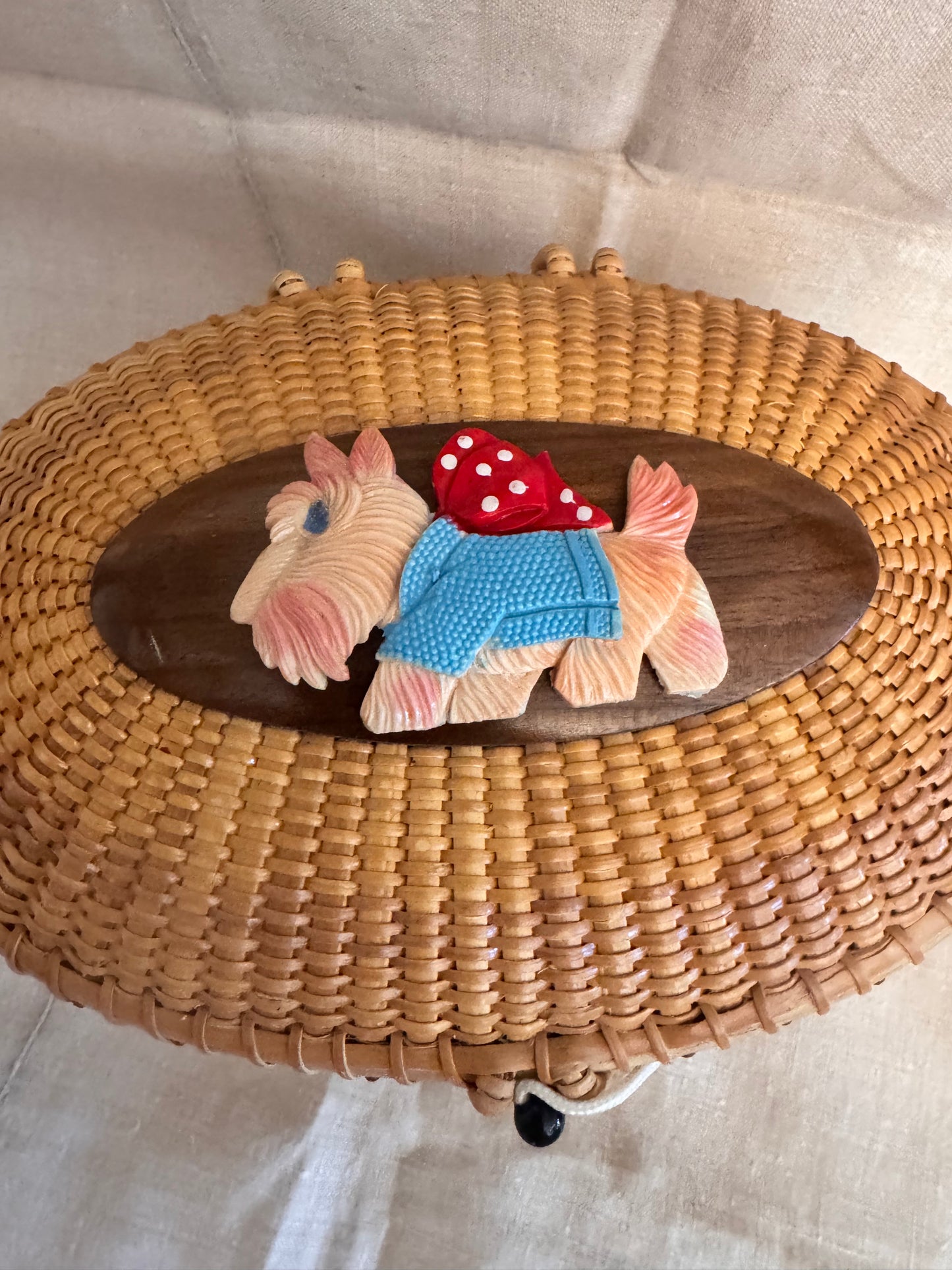 Large Oval Nantucket Basket with Adorable Vintage Celluloid Dog