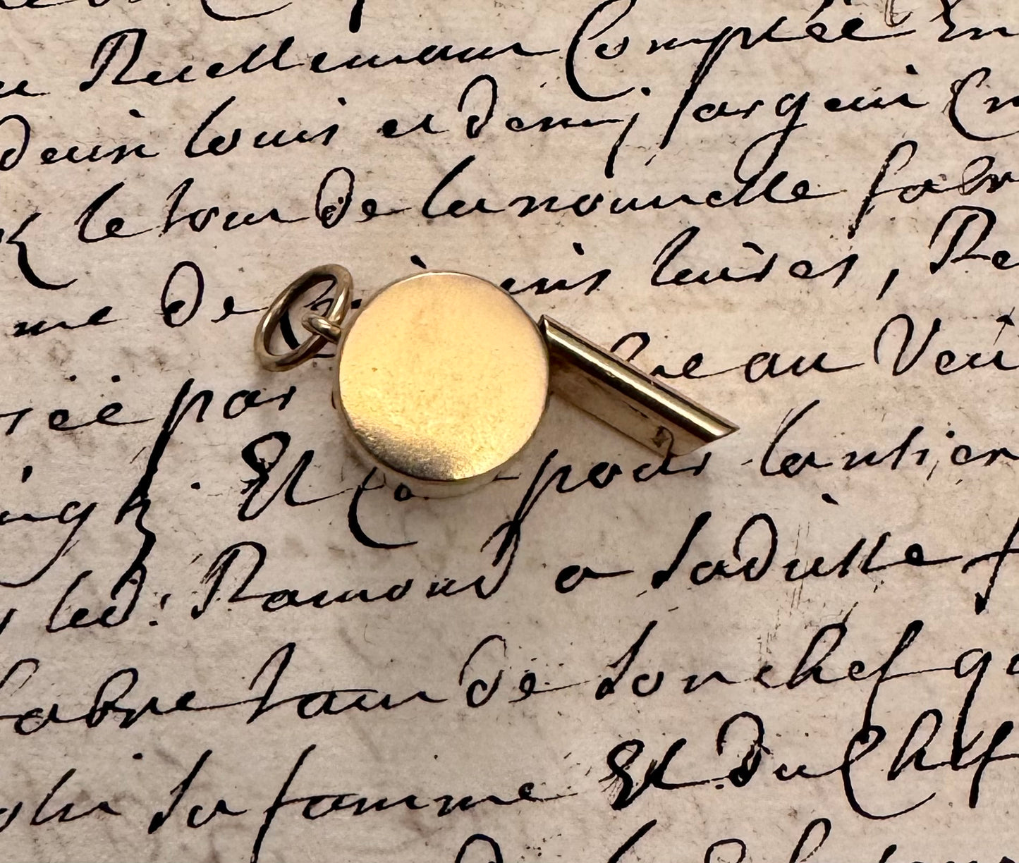 chunky 14 karat gold whistle by JM Fisher Co