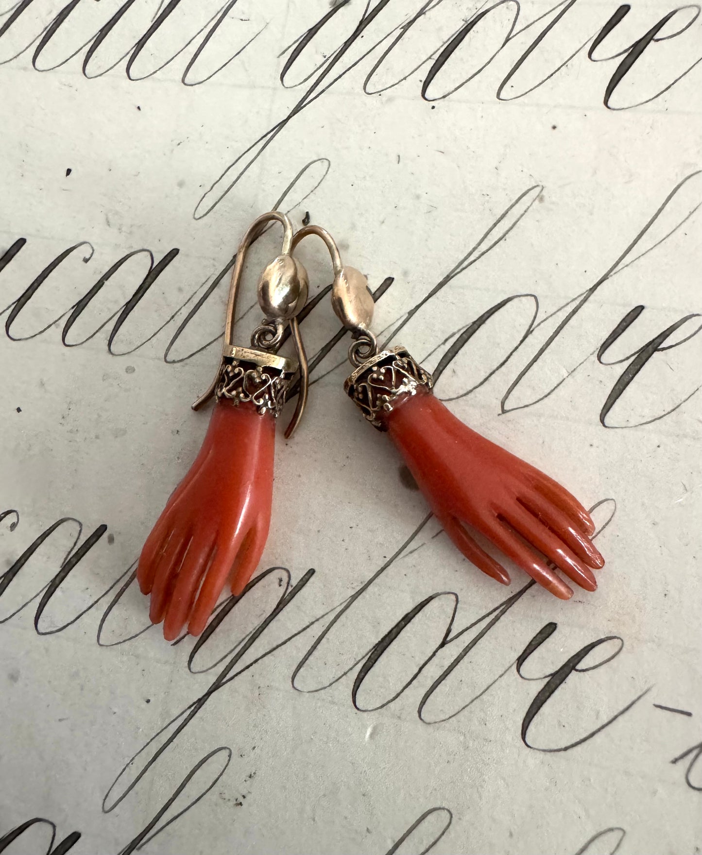 Rare pair of antique celluloid hand earrings