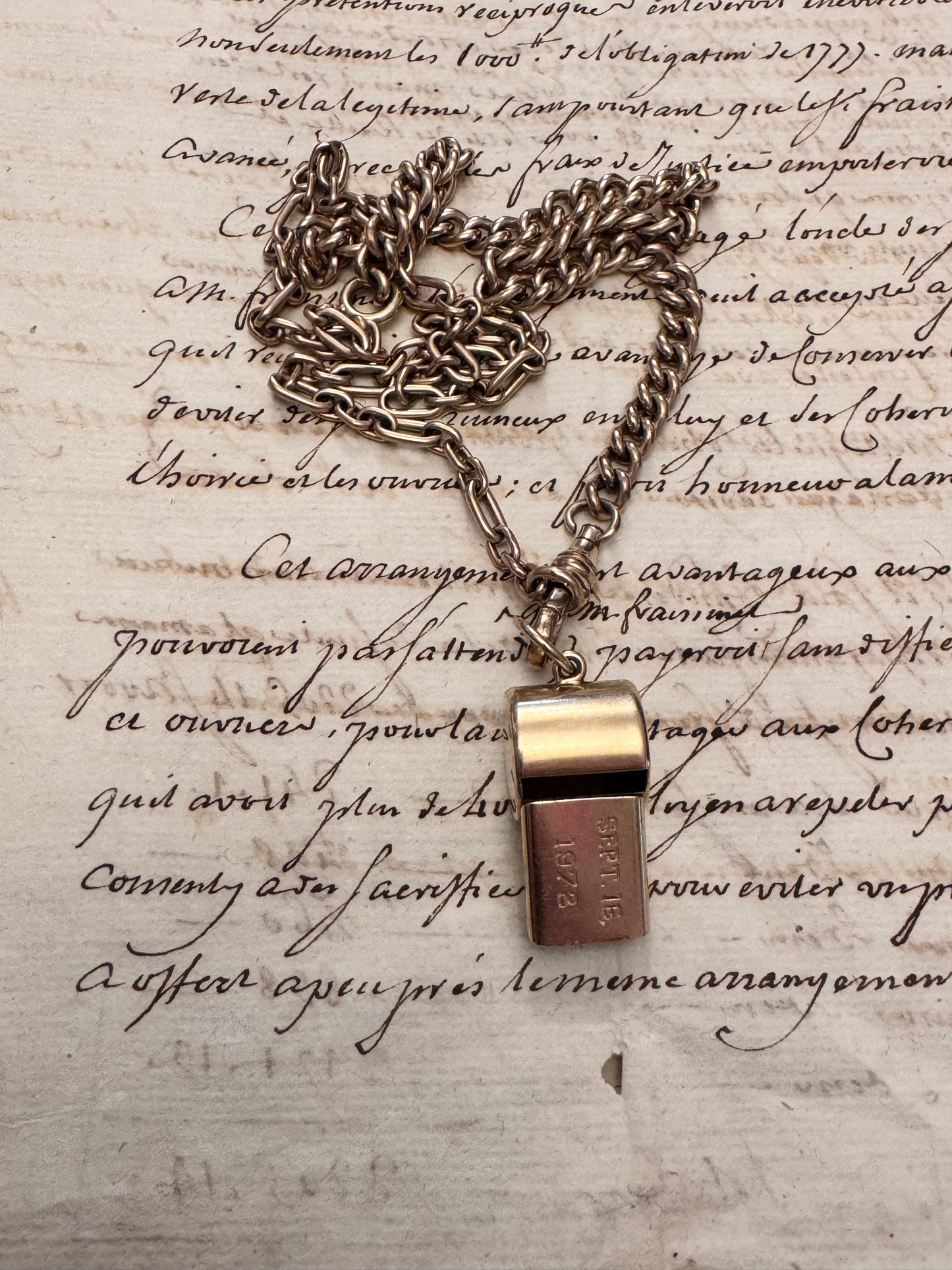chunky 14 karat gold whistle by JM Fisher Co