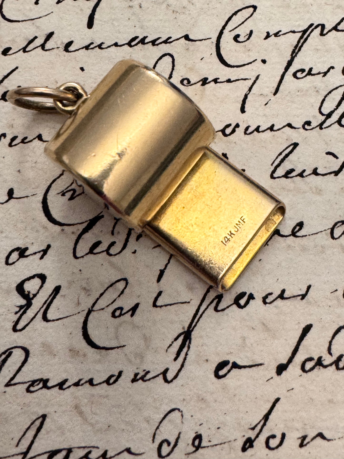 chunky 14 karat gold whistle by JM Fisher Co