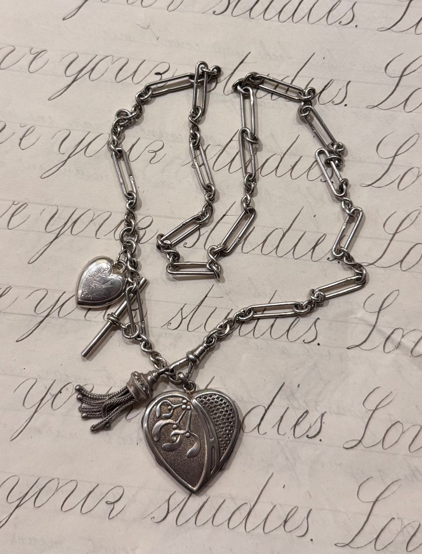 lovely English watch chain with two heart lockets and tassel