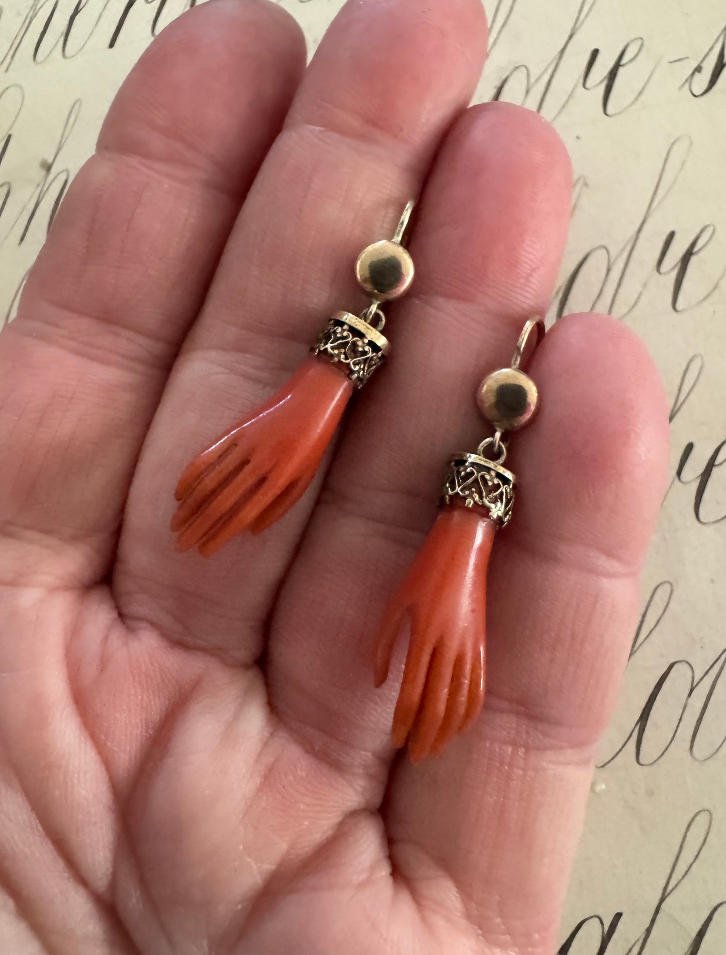 Rare pair of antique celluloid hand earrings