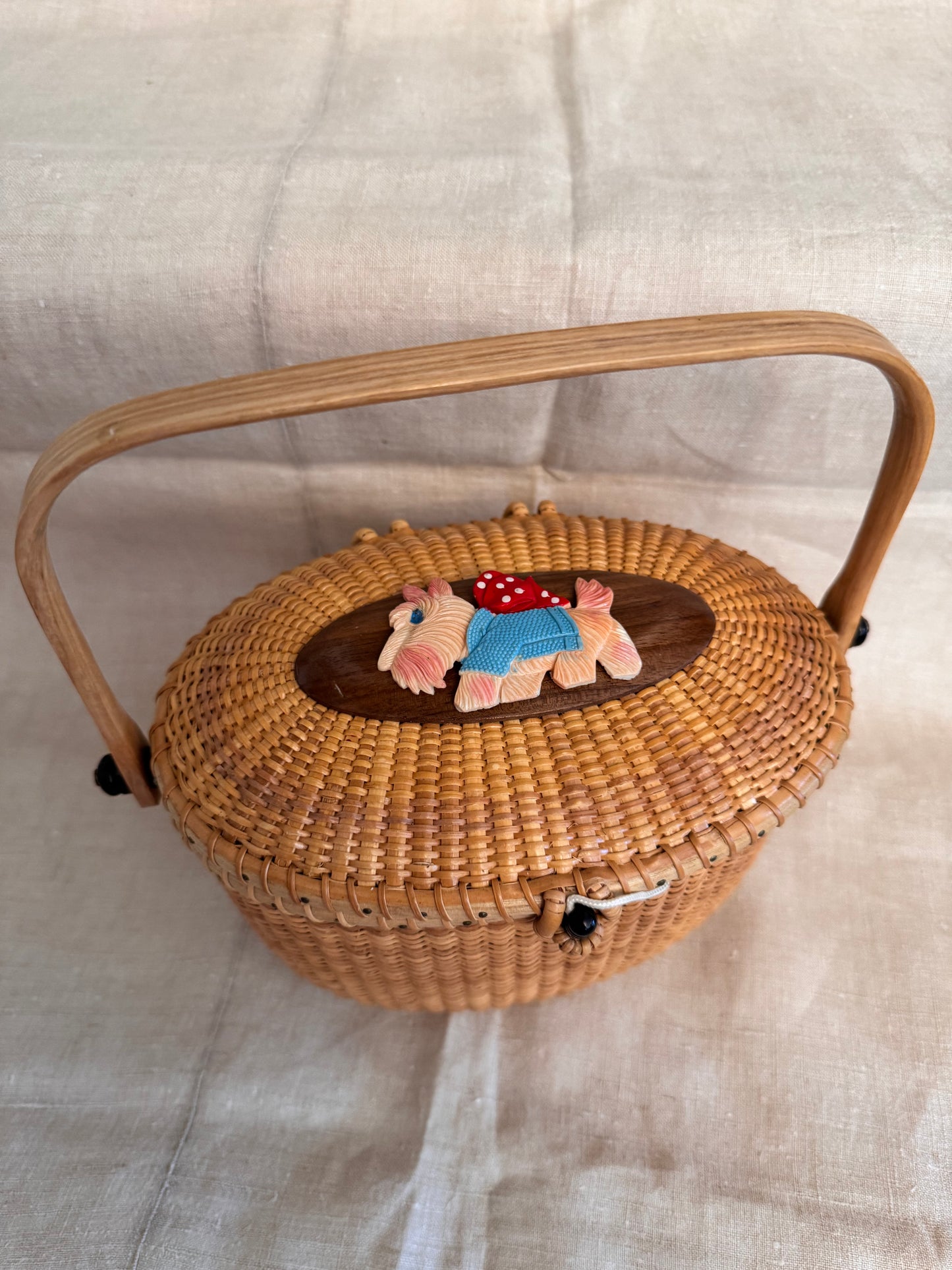 Large Oval Nantucket Basket with Adorable Vintage Celluloid Dog