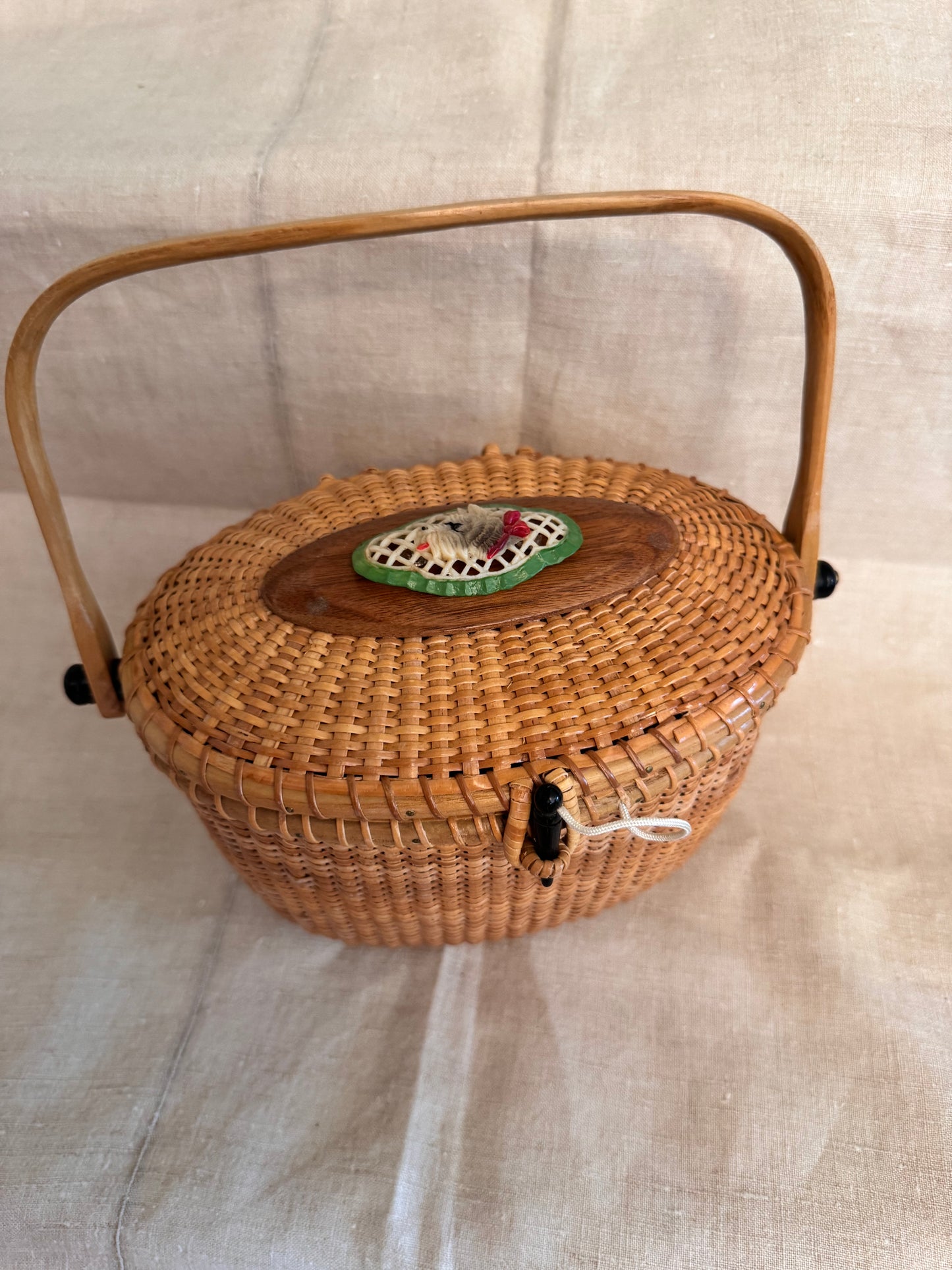 Large Oval Nantucket Basket with Charming Celluloid Scottie with Red Bow