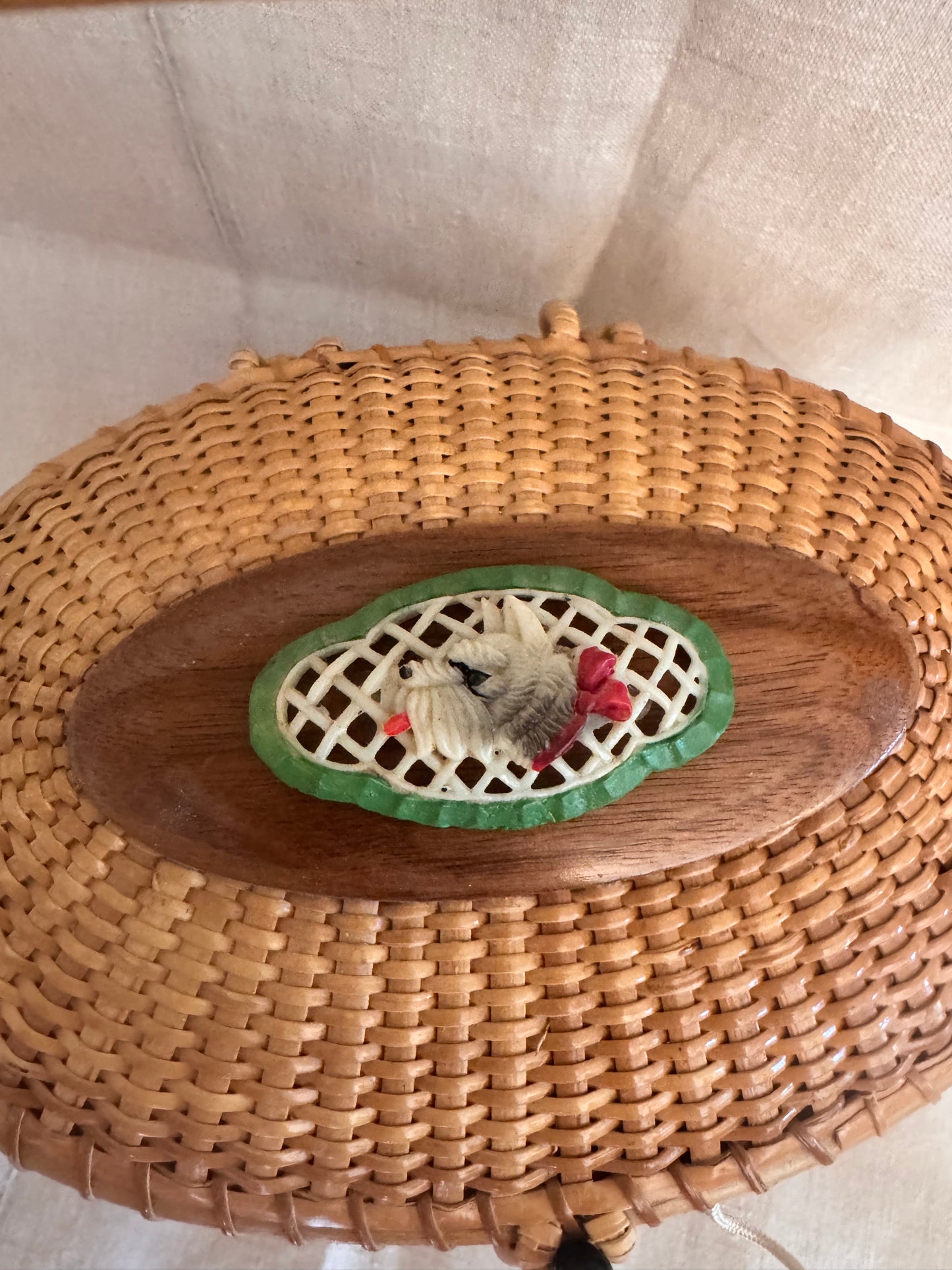 Large Oval Nantucket Basket with Charming Celluloid Scottie with Red Bow