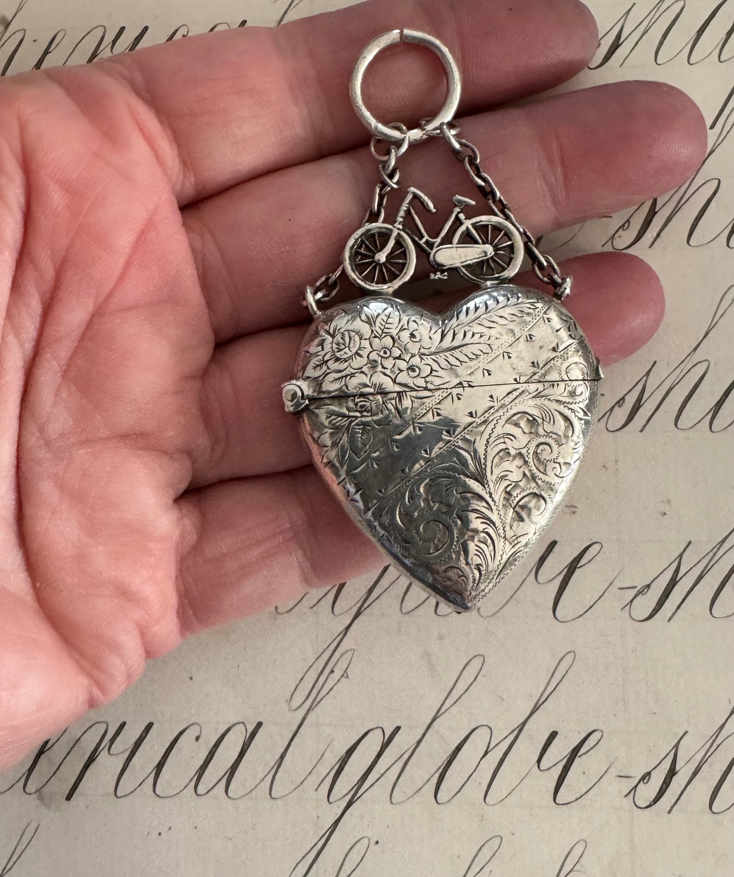 Incredible heart shaped match safe with bicycle