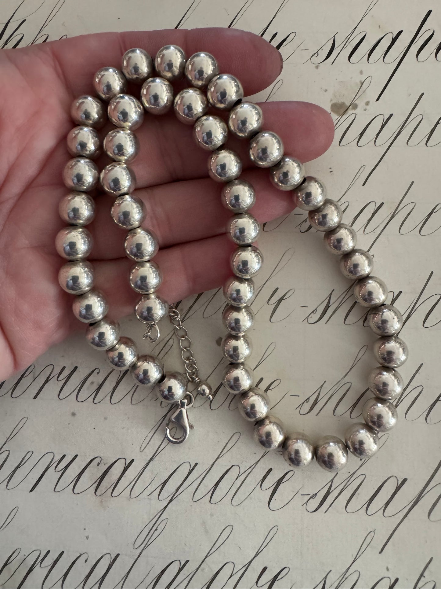 Heavy adjustable length silver bead necklace