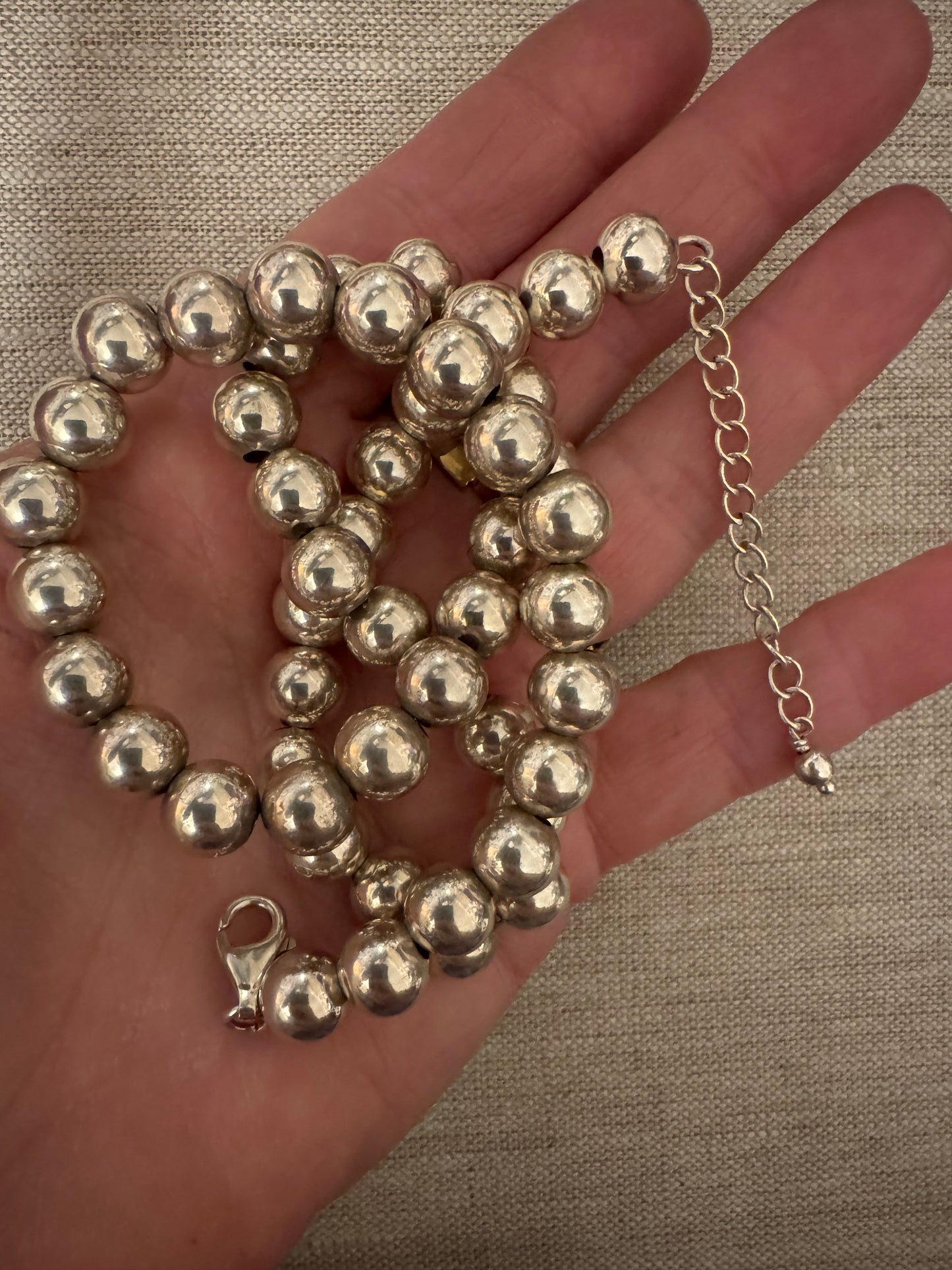 Heavy adjustable length silver bead necklace