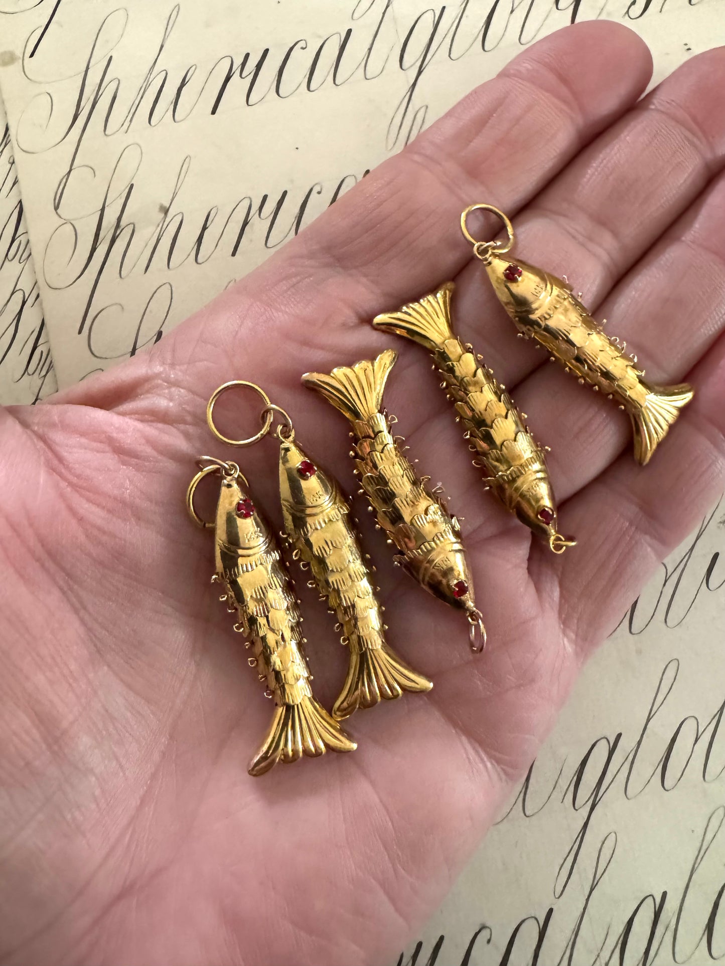 Gold Articulated Fish Pendants