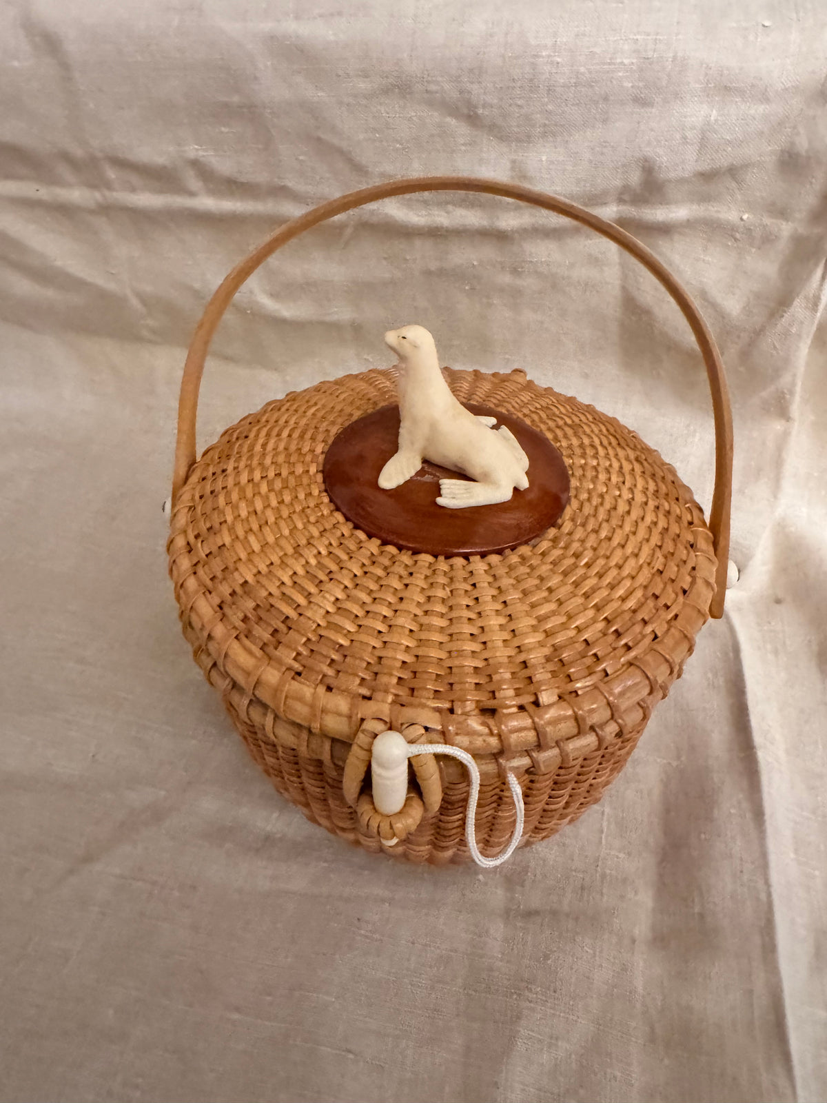Medium Round Basket with Faux Ivory 3-Dimensional Seal on the Lid