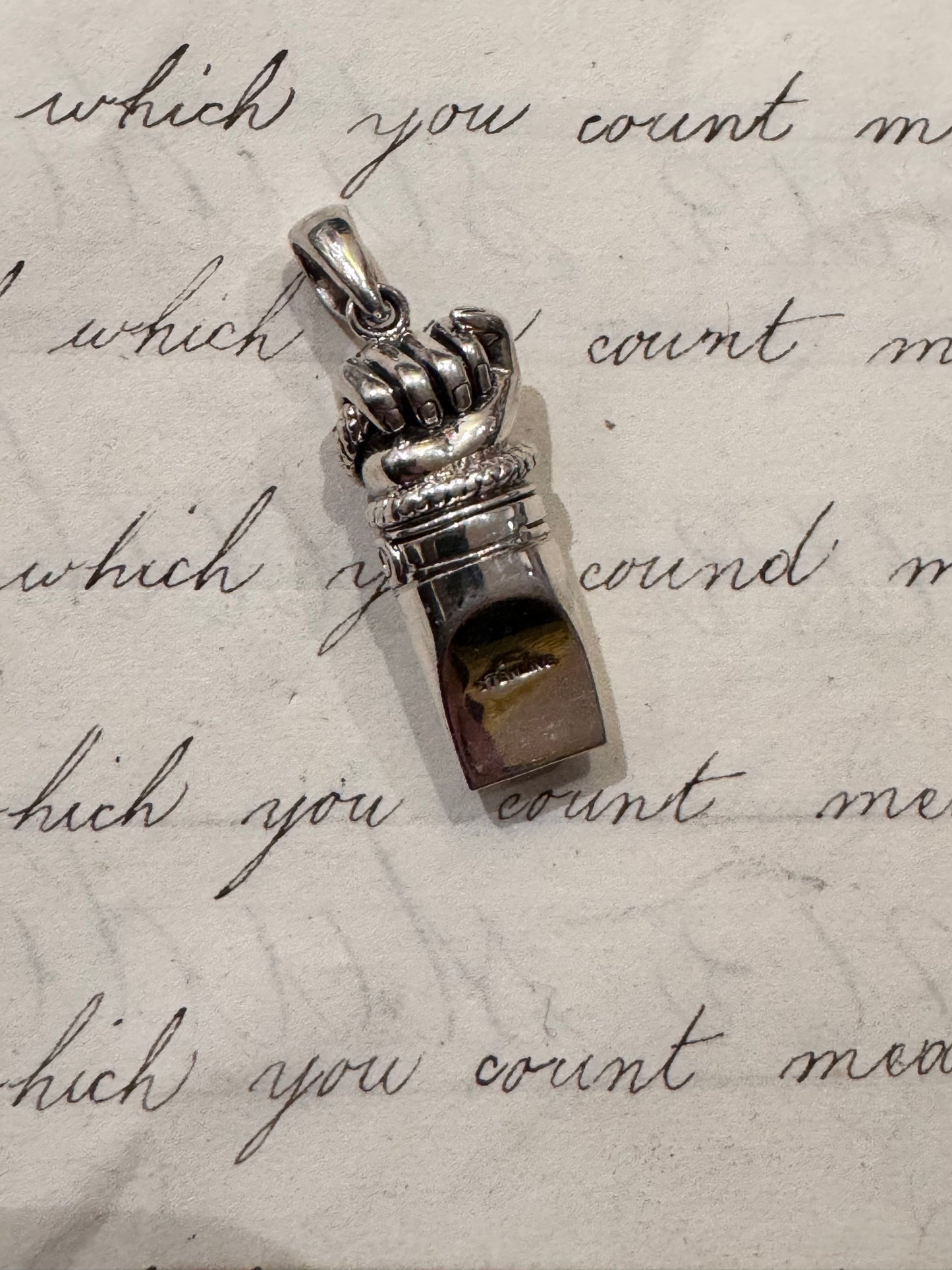incredible English Sterling whistle with a fist clutching a snake