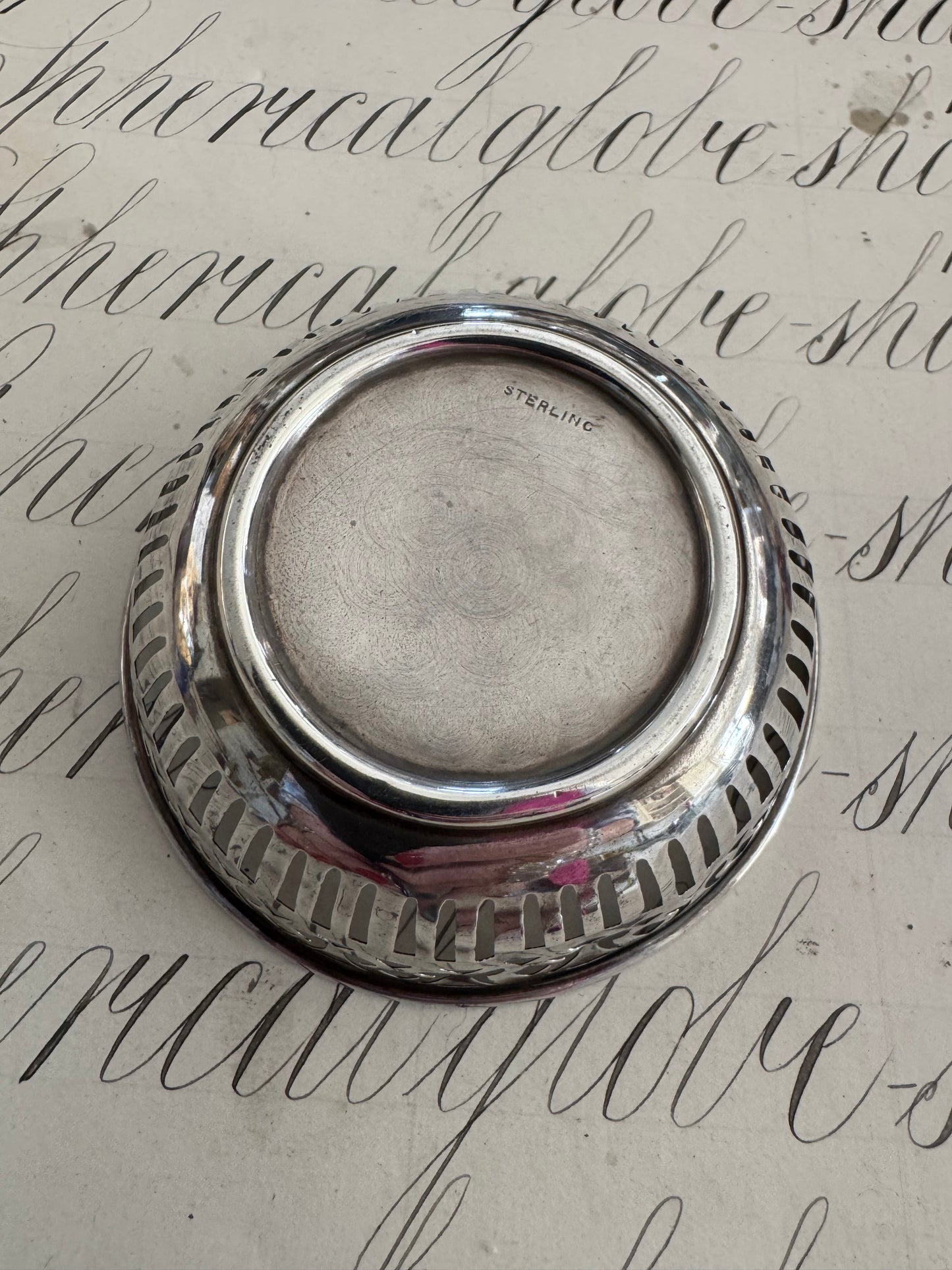 charming small round sterling pierced trinket dish