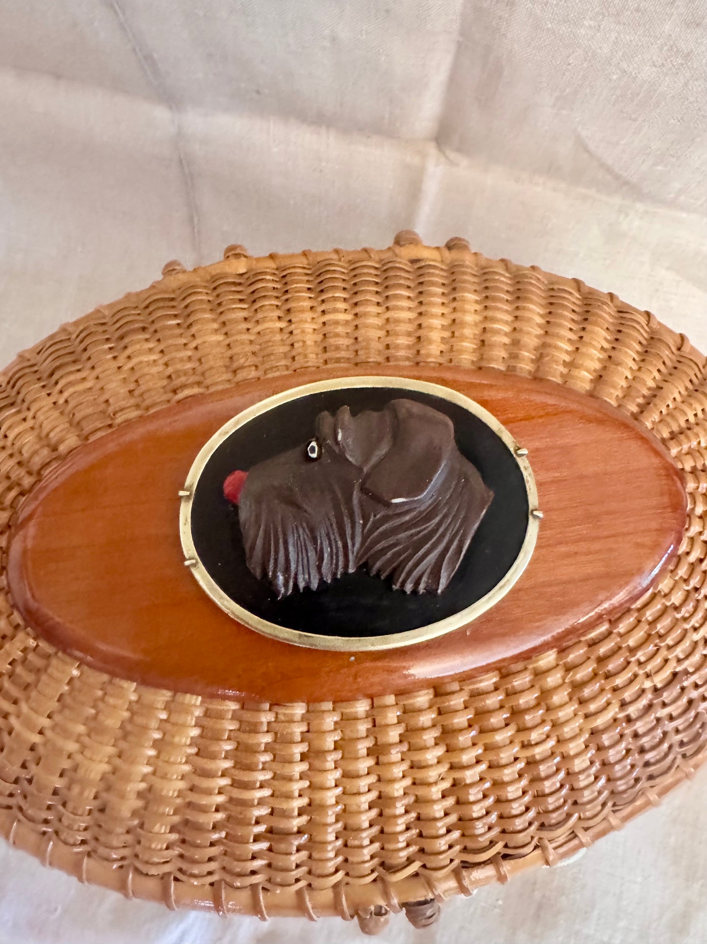 Large Oval Nantucket Basket with Carved Vintage Bakelite Dog in Brass Frame