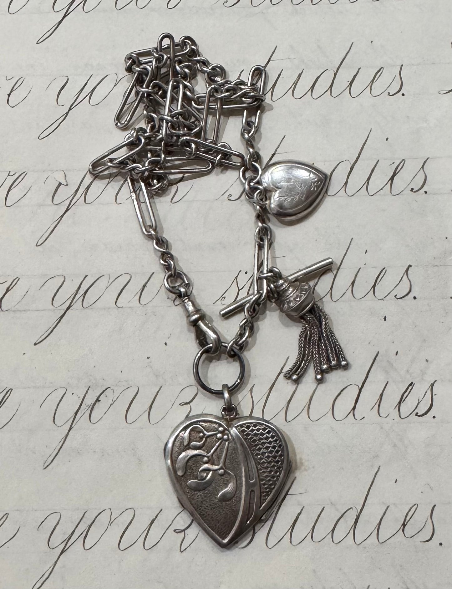 lovely English watch chain with two heart lockets and tassel