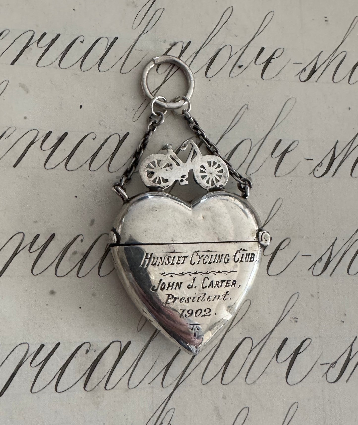 Incredible heart shaped match safe with bicycle
