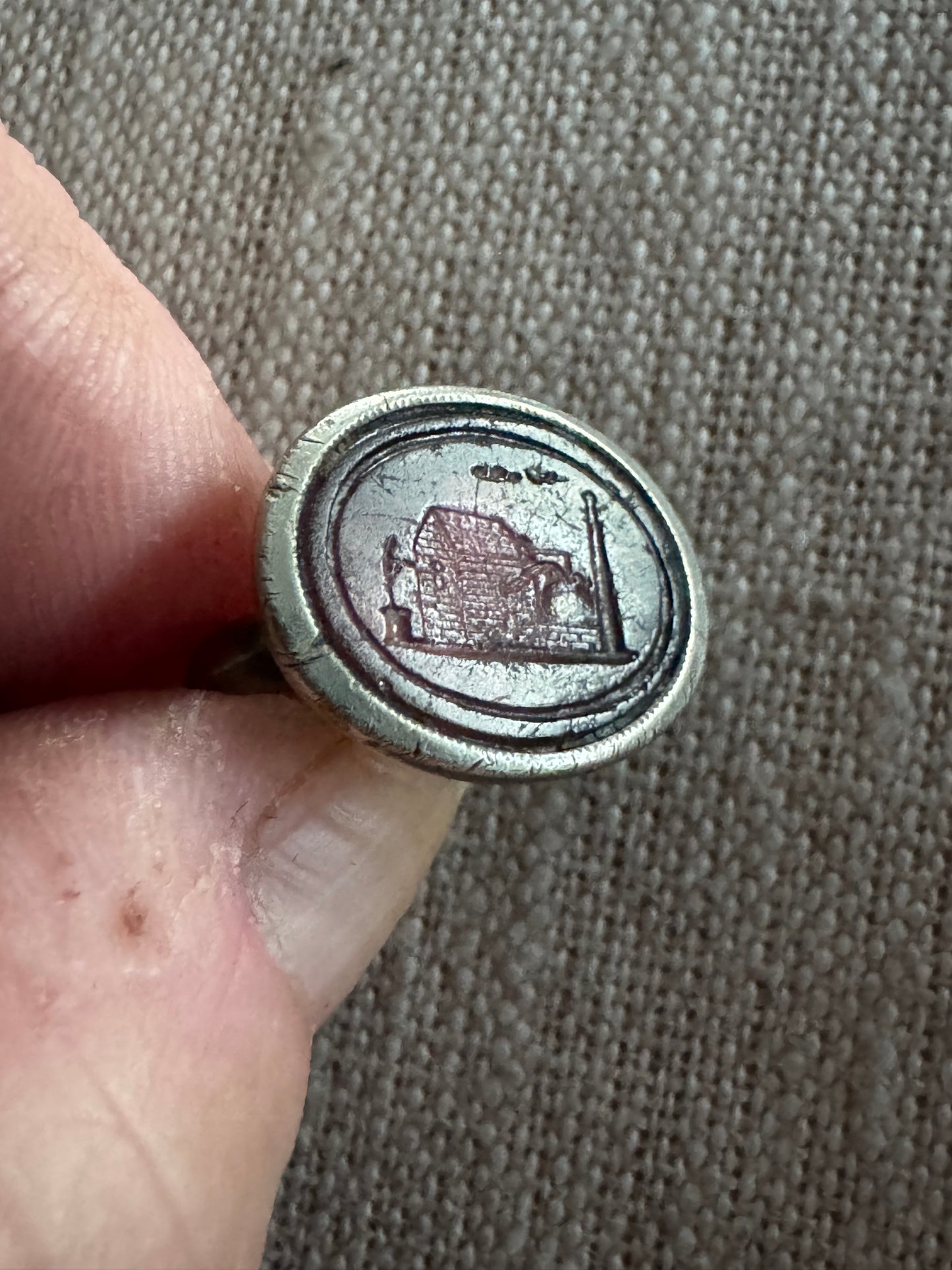 small antique sterling silver fob with carved glass intaglio